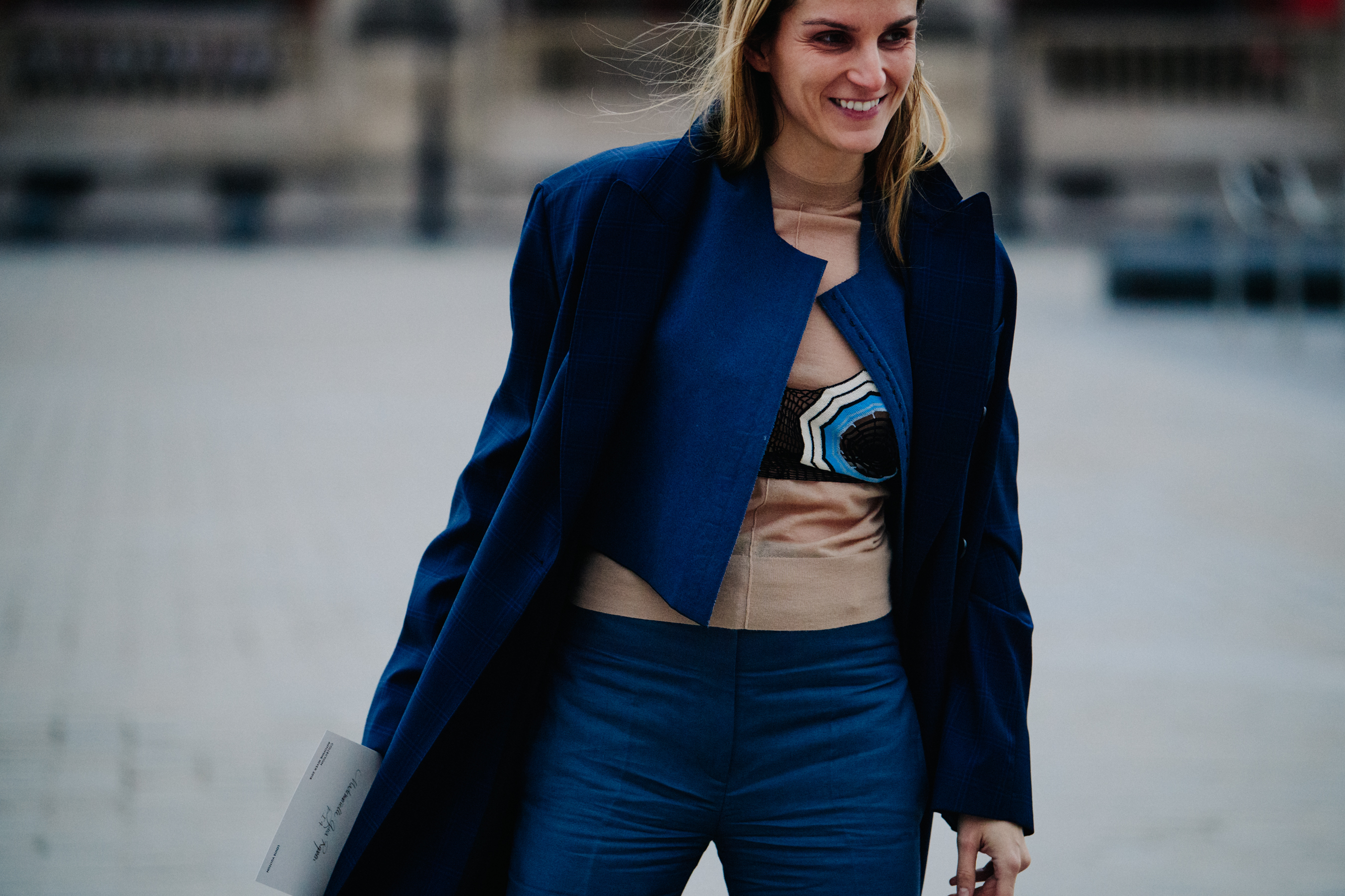 Woman wearing blue pants and top