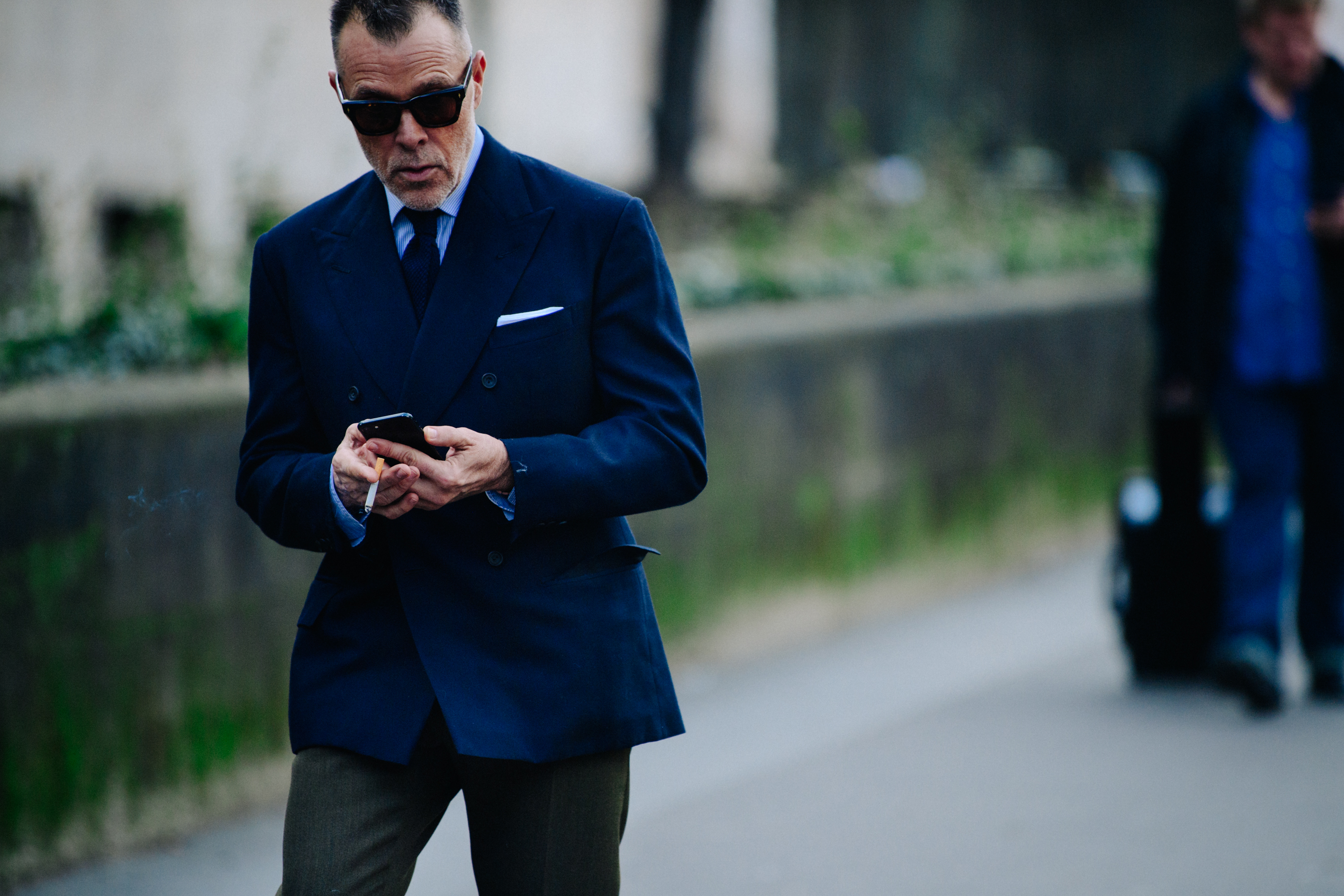 Man wearing dark blue suit