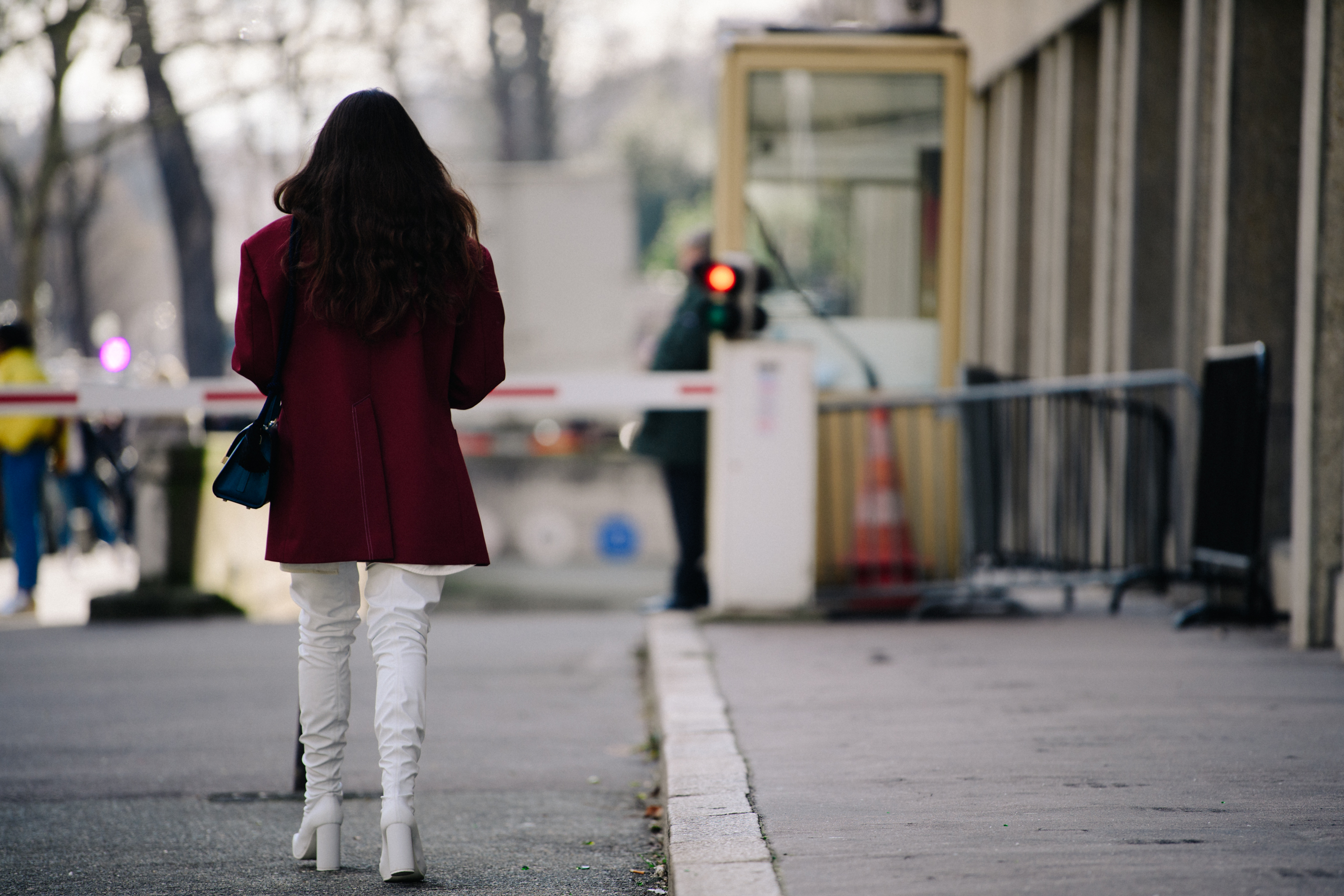Woman wearing white plastic boots