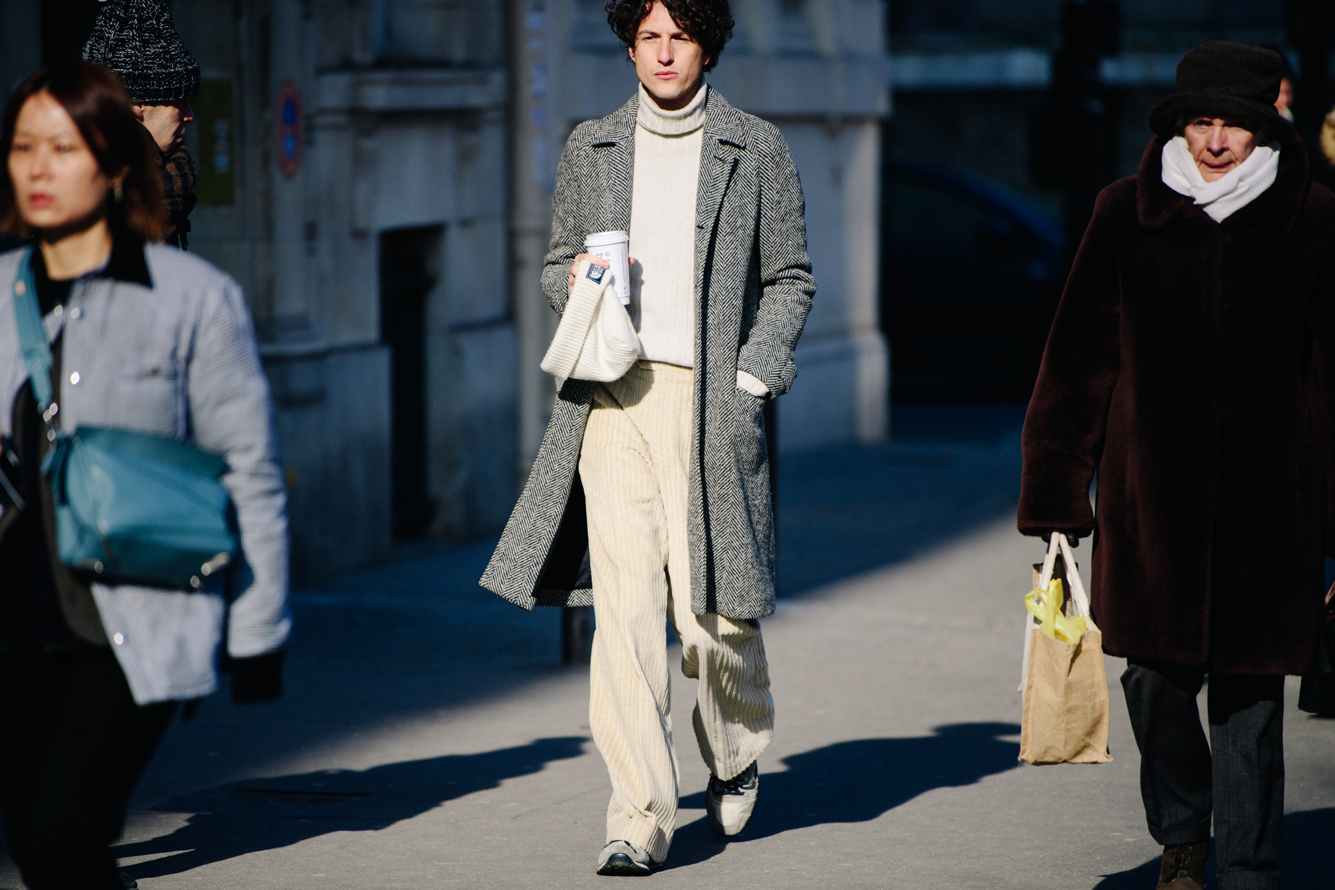 Man wearing herringbone coat
