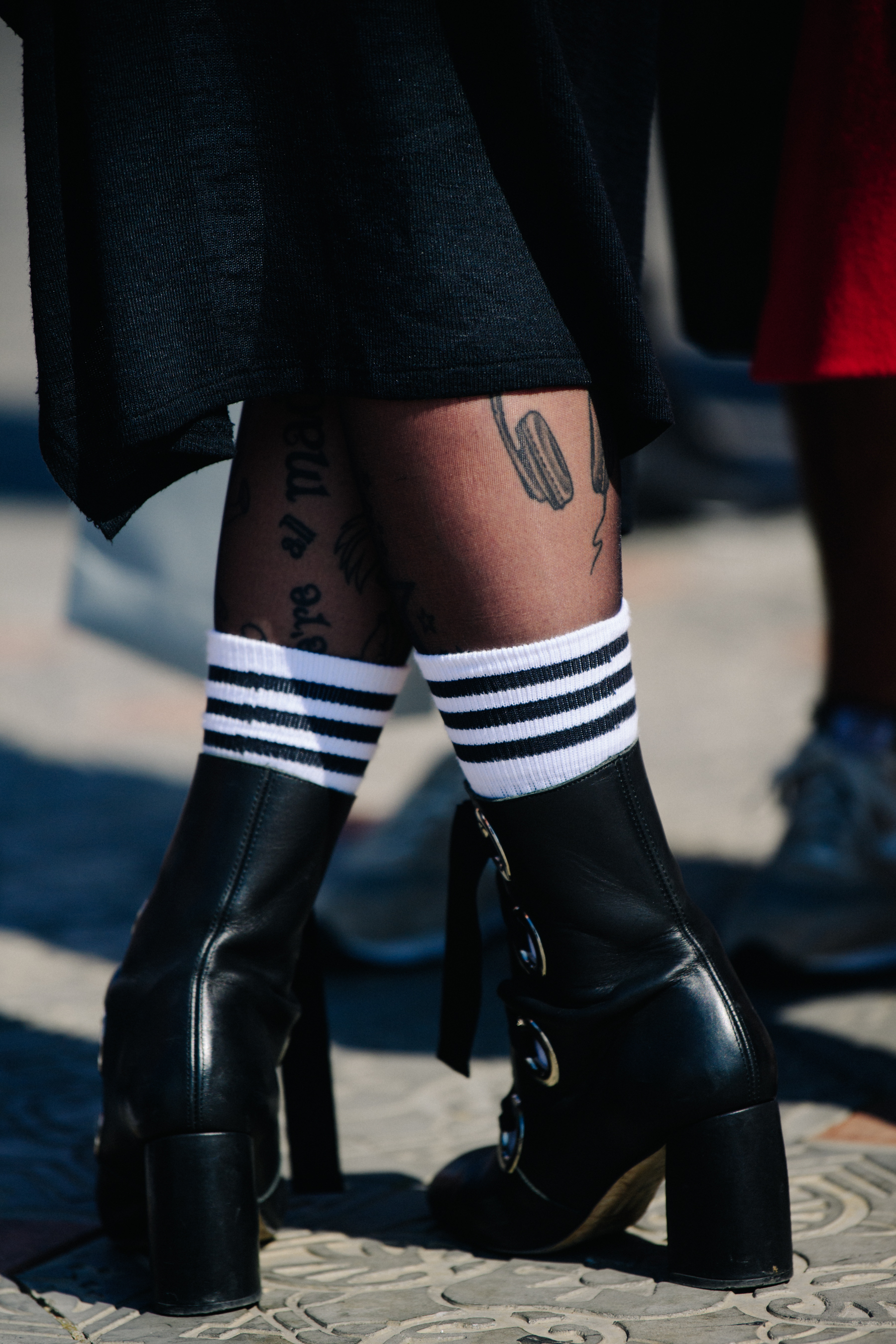 Woman wearing black boots