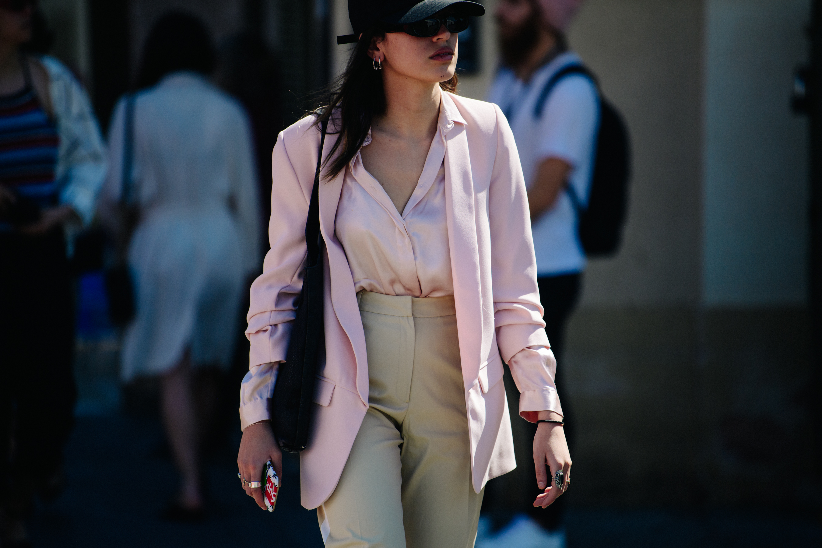Woman wearing pink shirt and jacket