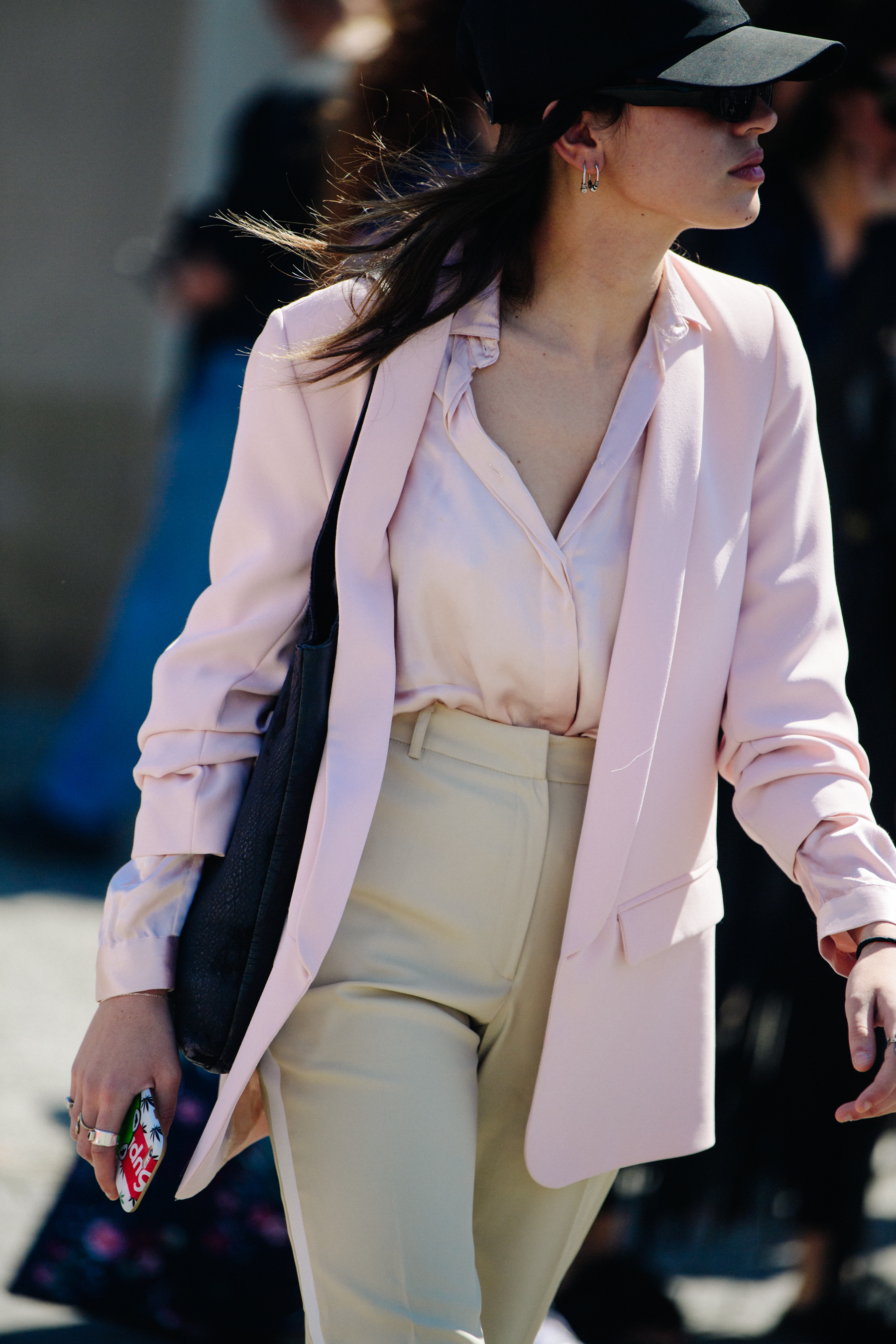 Woman wearing pink shirt and jacket