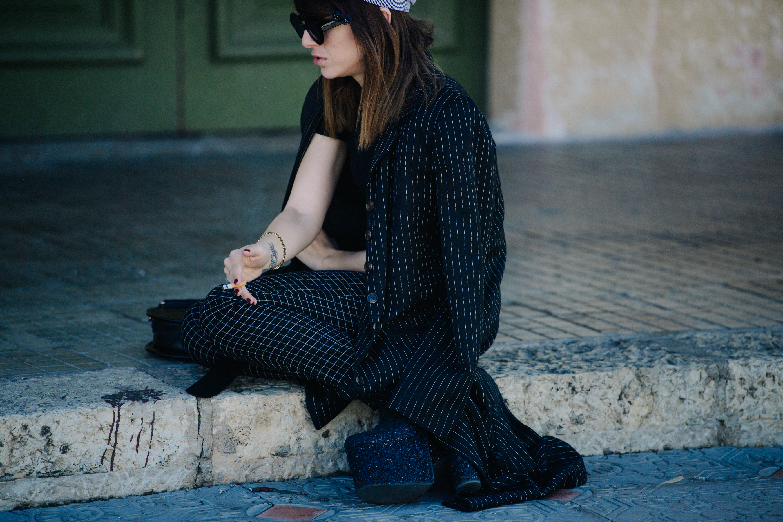 Woman wearing stripes and check pattern