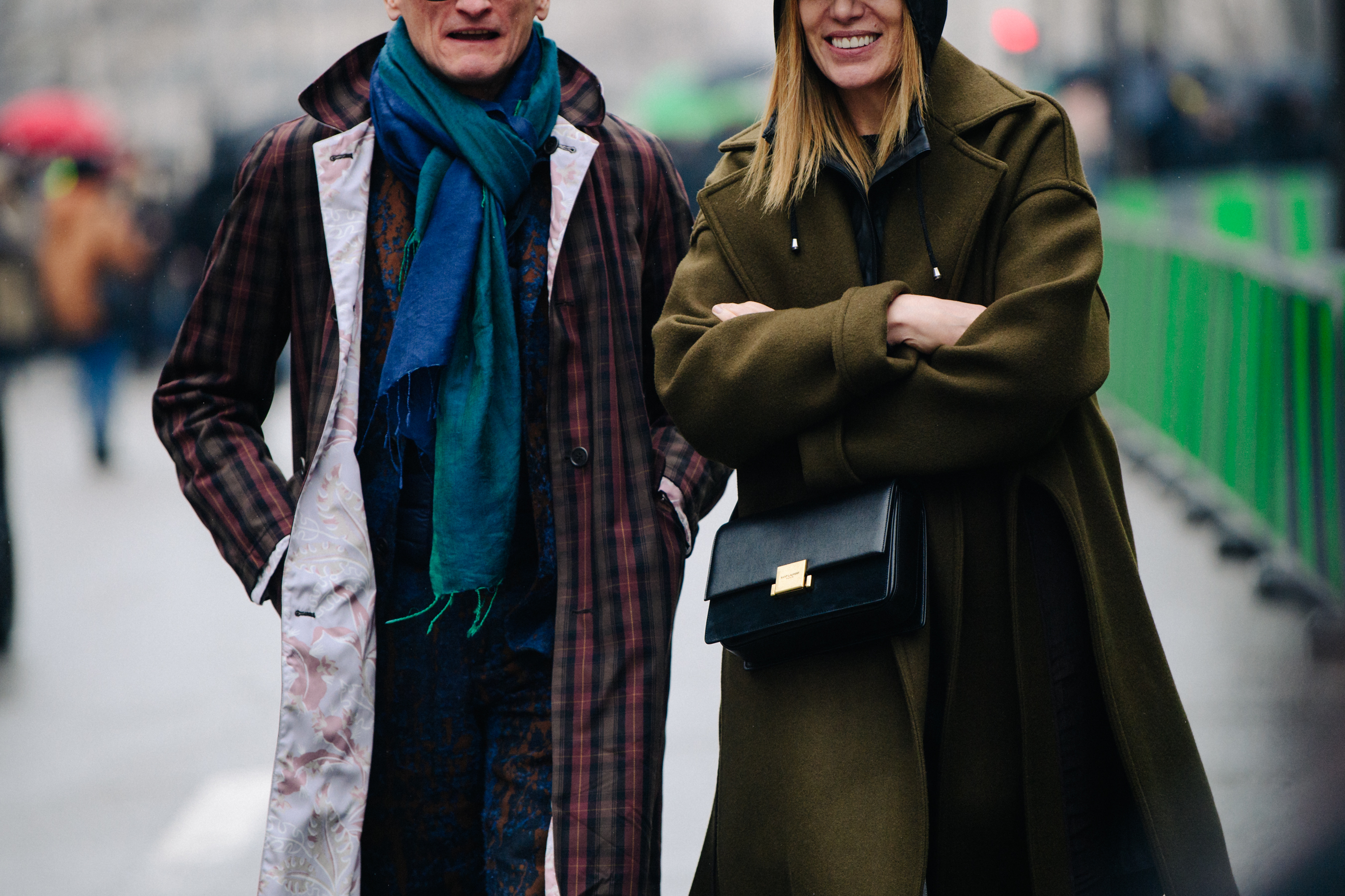 Couple wearing long winter coats