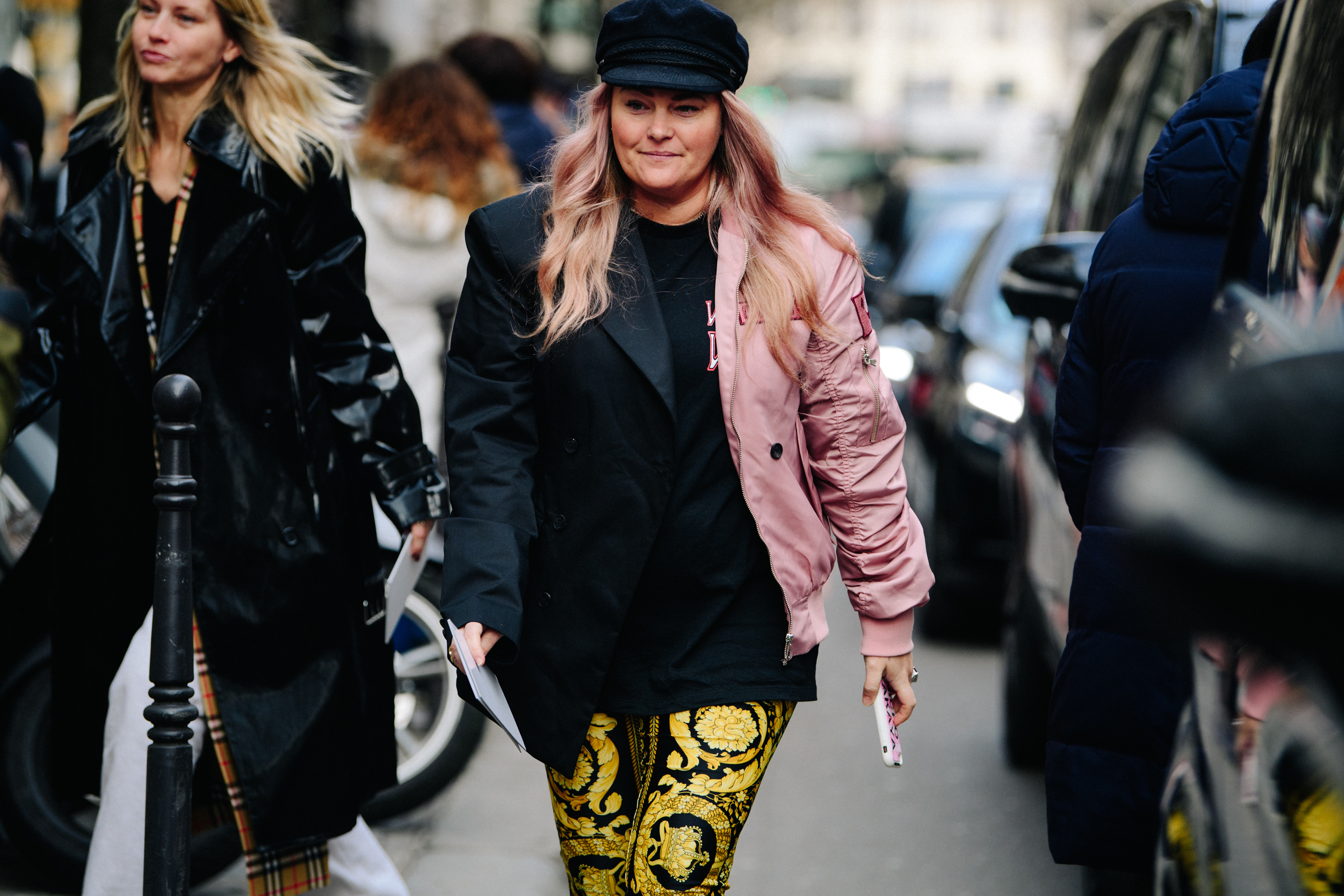 Woman wearing pink and black jacket
