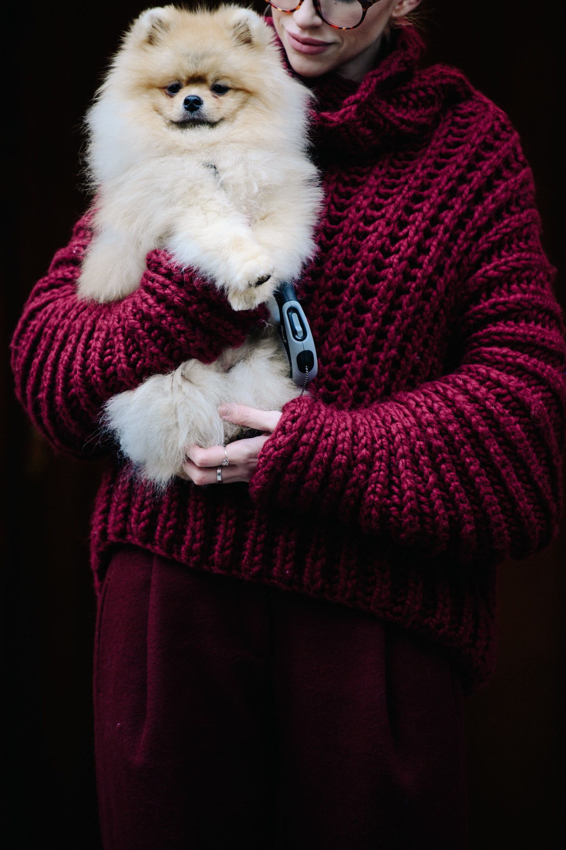 Woman wearing dark red knit