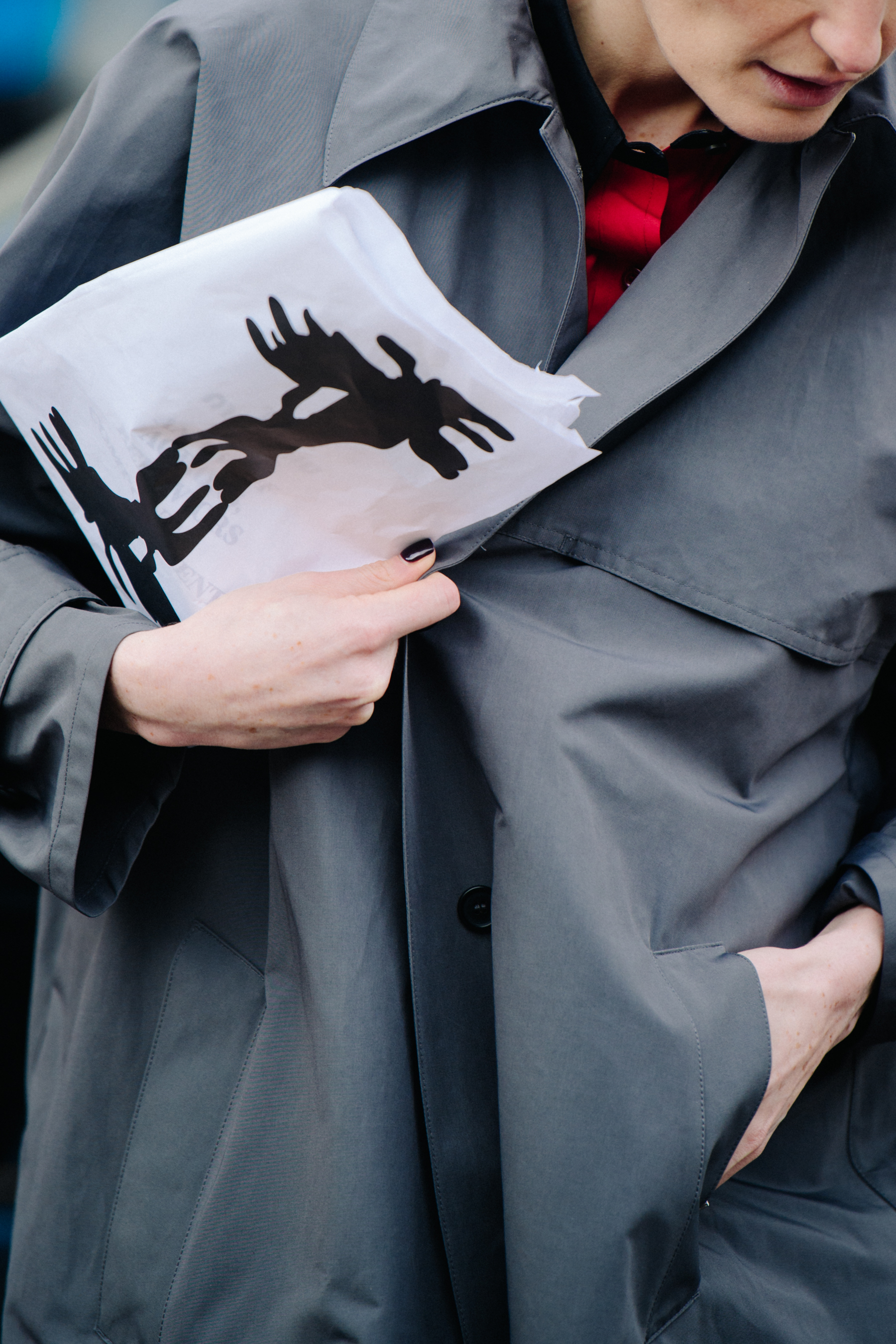 Woman wearing grey coat