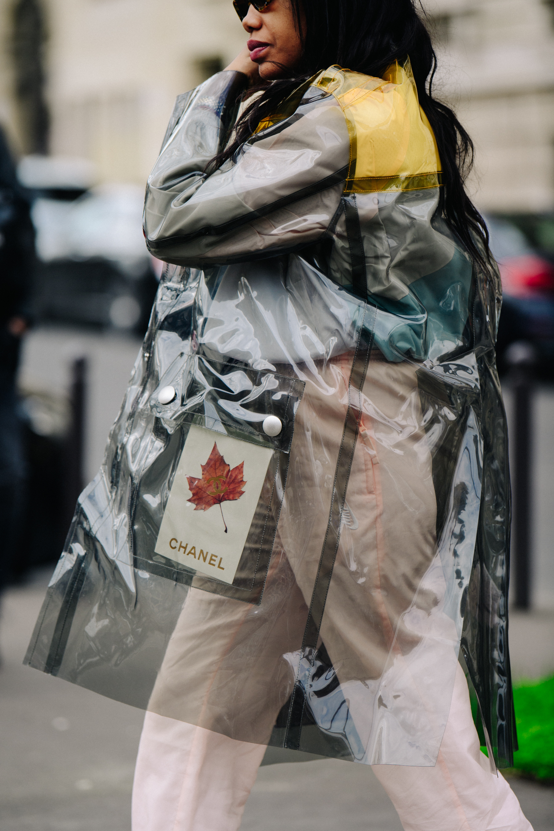 Woman wearing plastic coat
