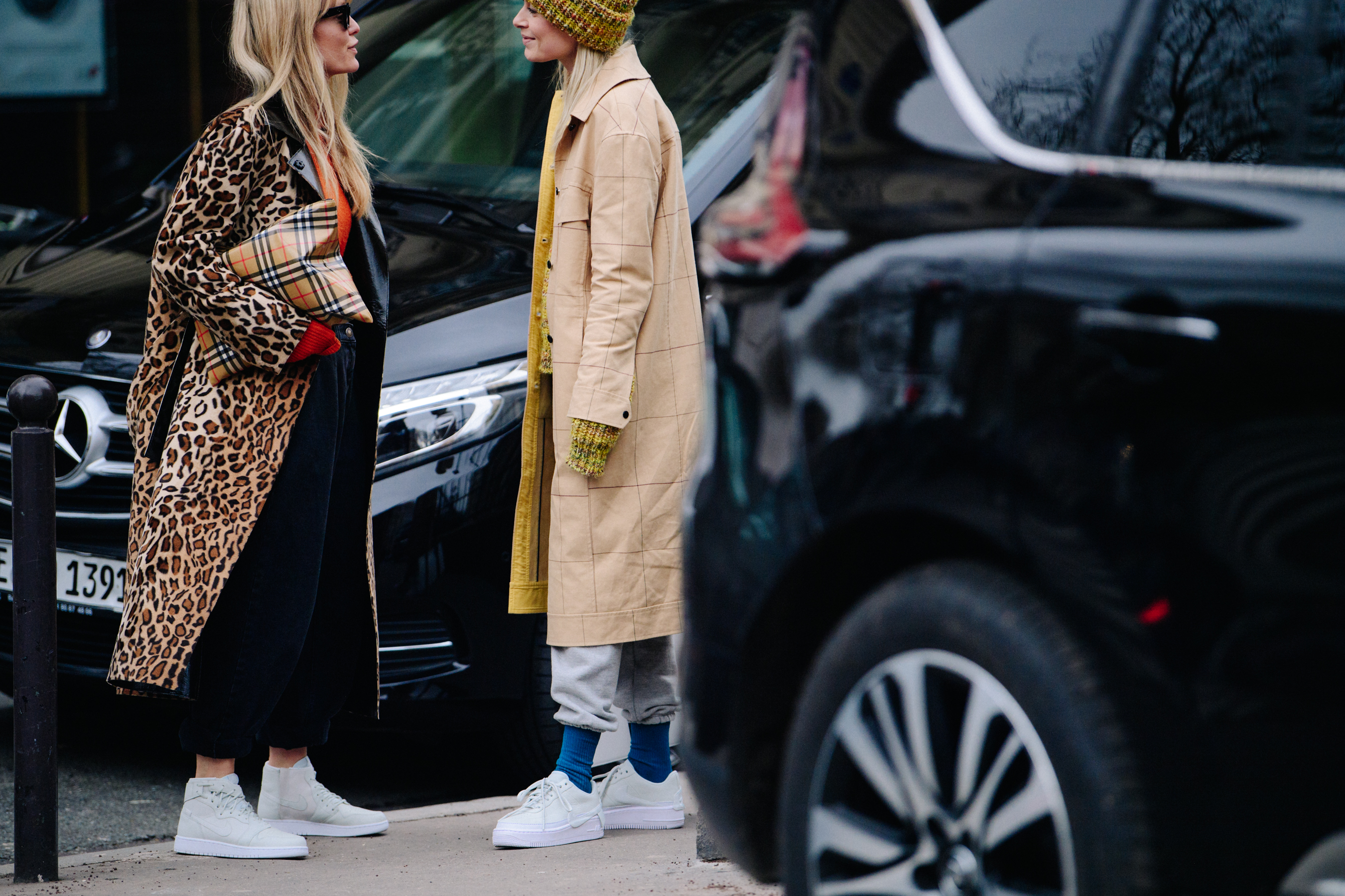 Two Danish women wearing Nike sneakers