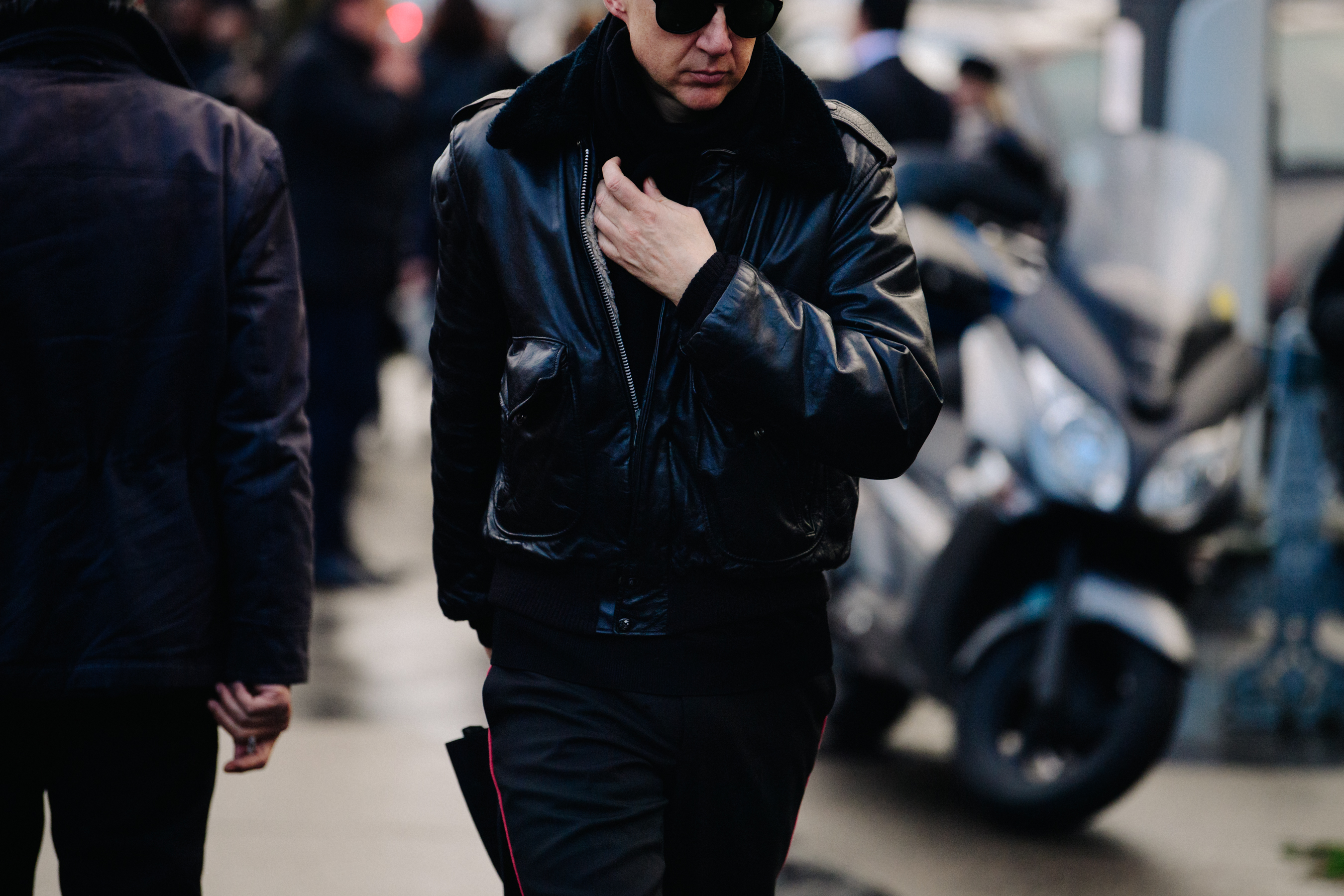 Man wearing black leather jacket