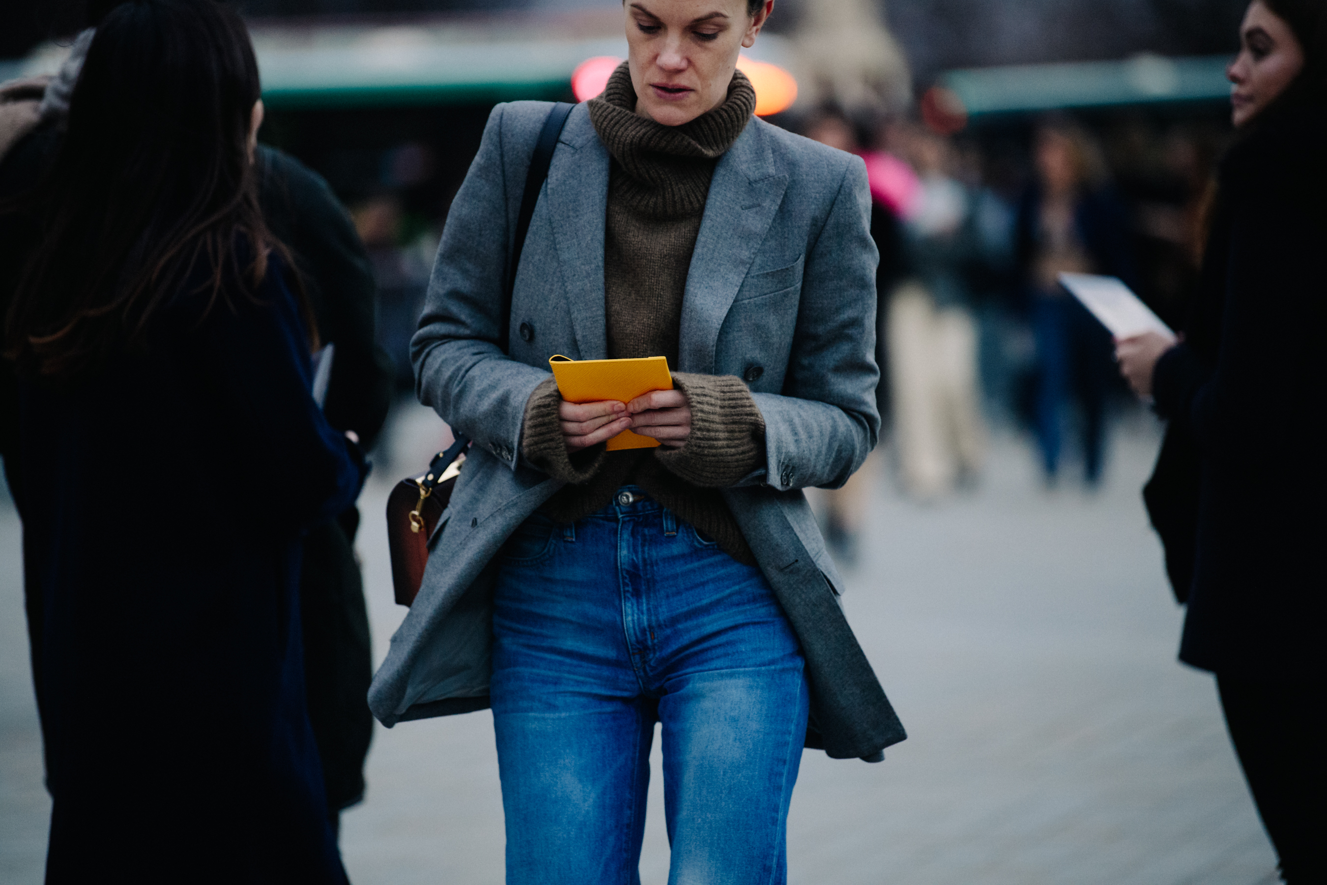 Editor wearing grey jacket