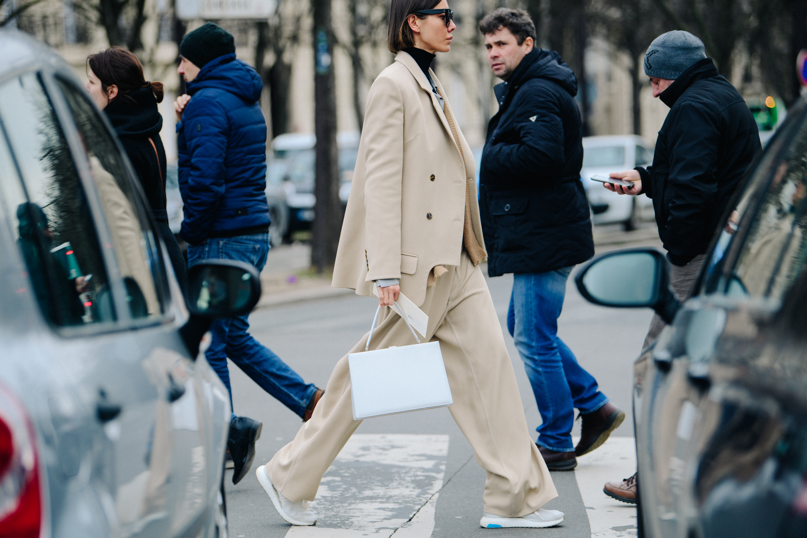 Woman wearing tan suit