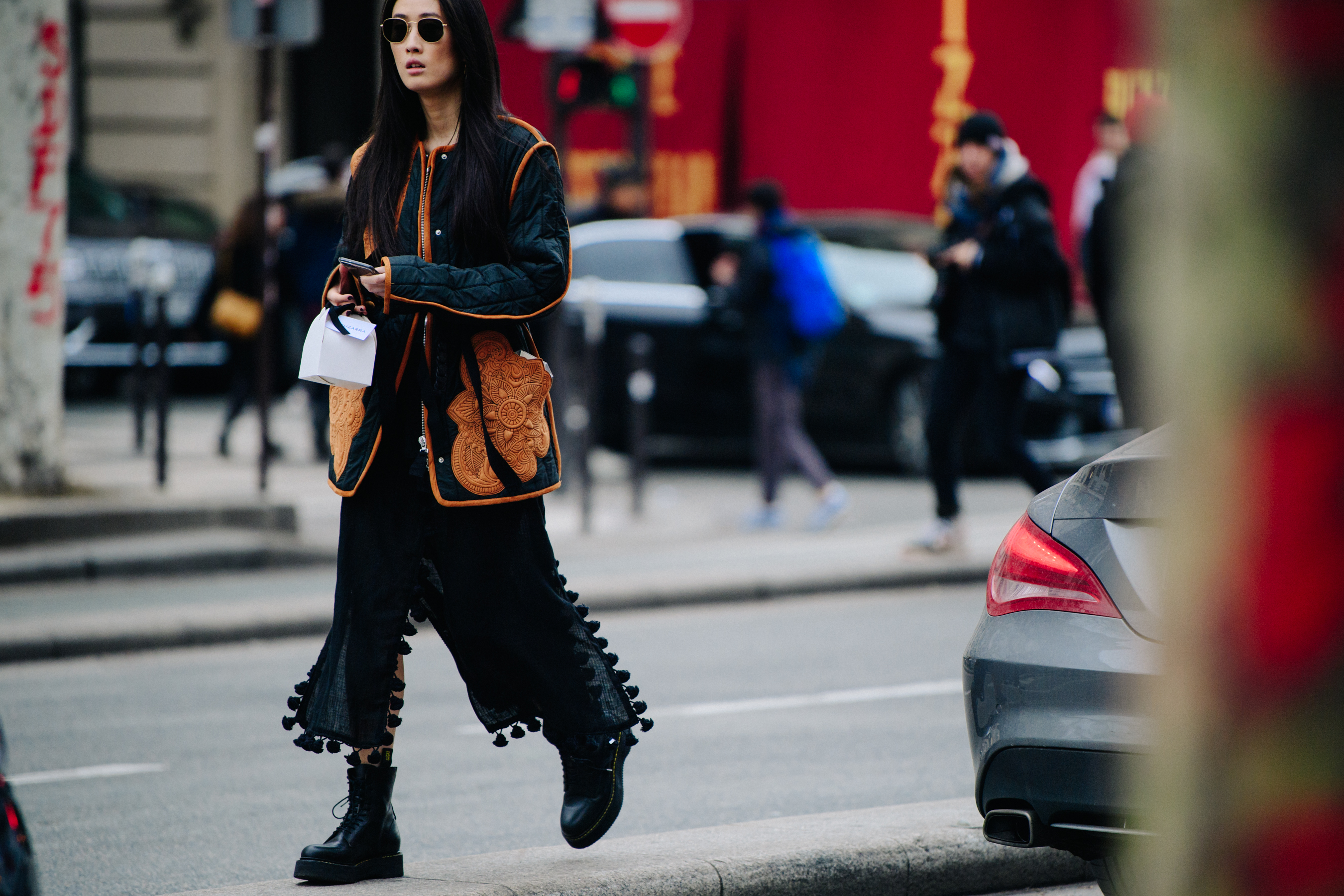 Asian woman wearing Oriental style coat