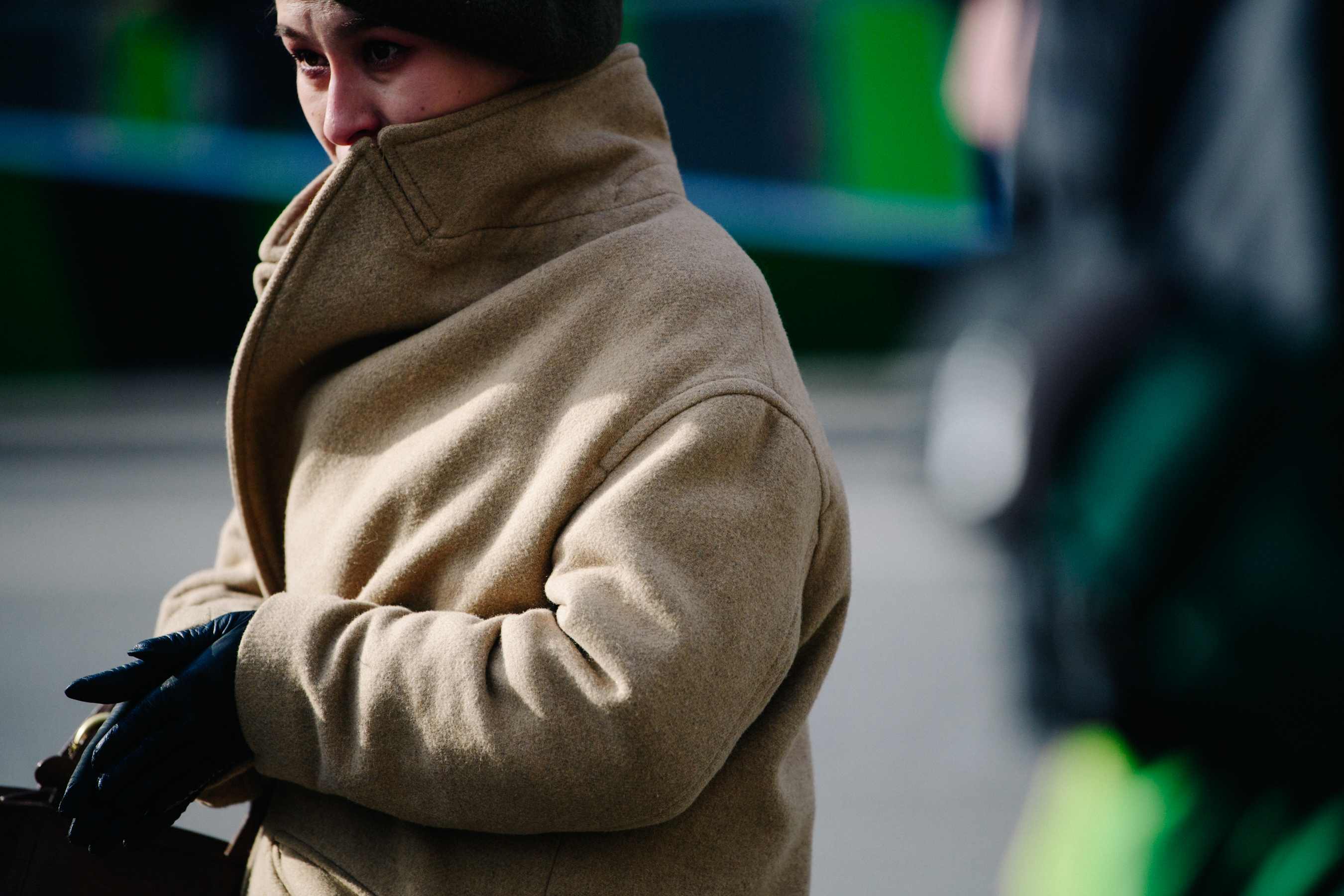 Woman wearing tan wool coat