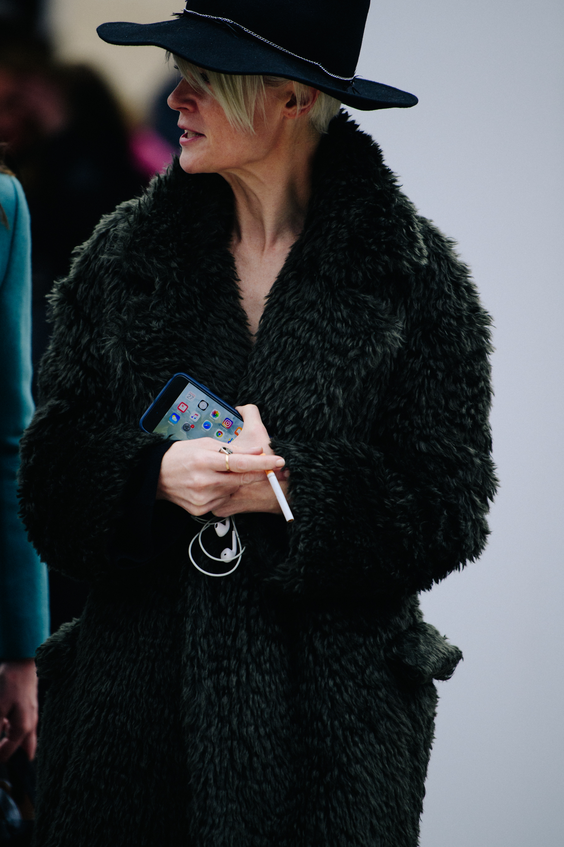 Woman wearing dark fur coat