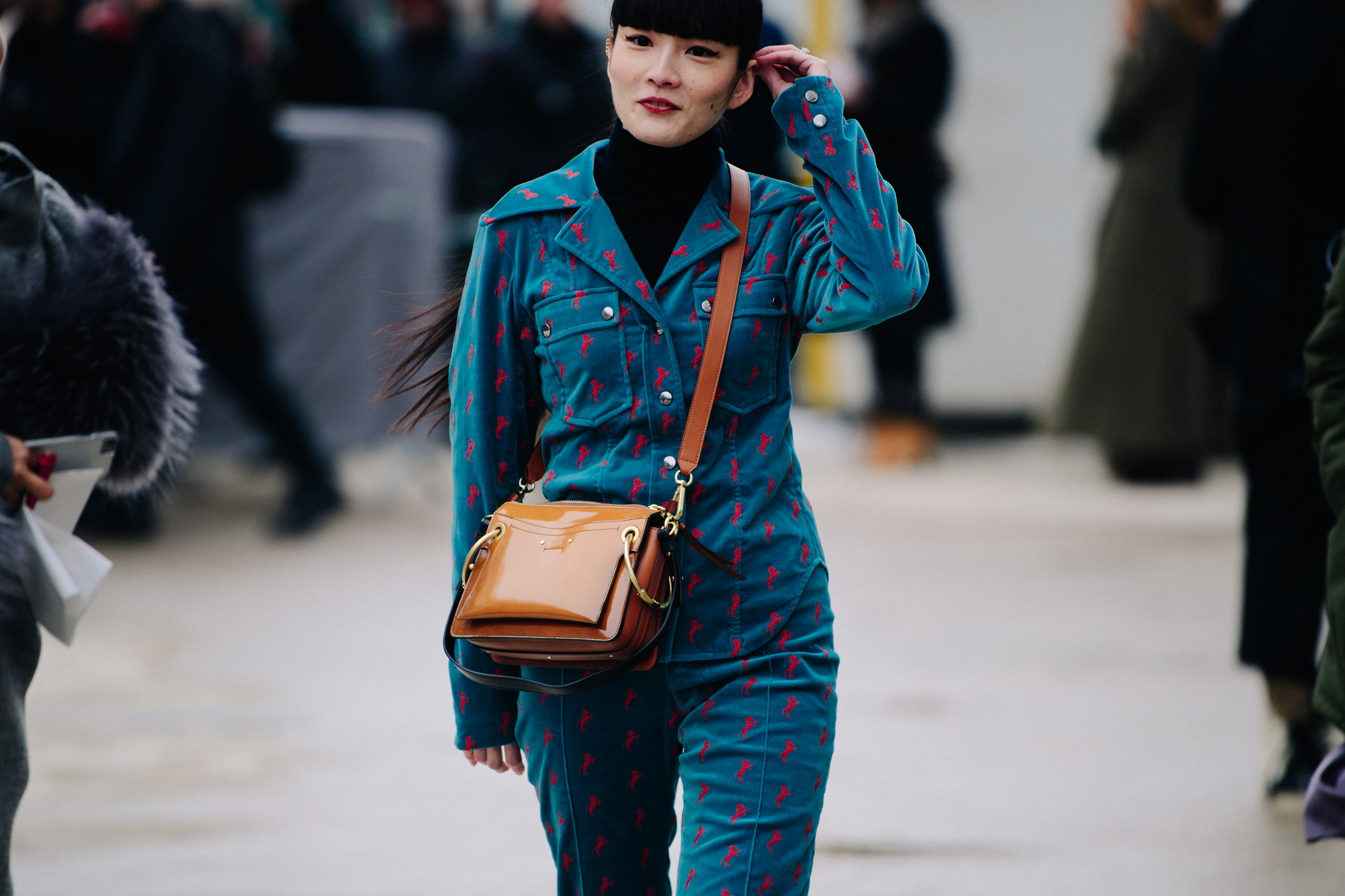 Japanese woman wearing Chloé shirt and pants
