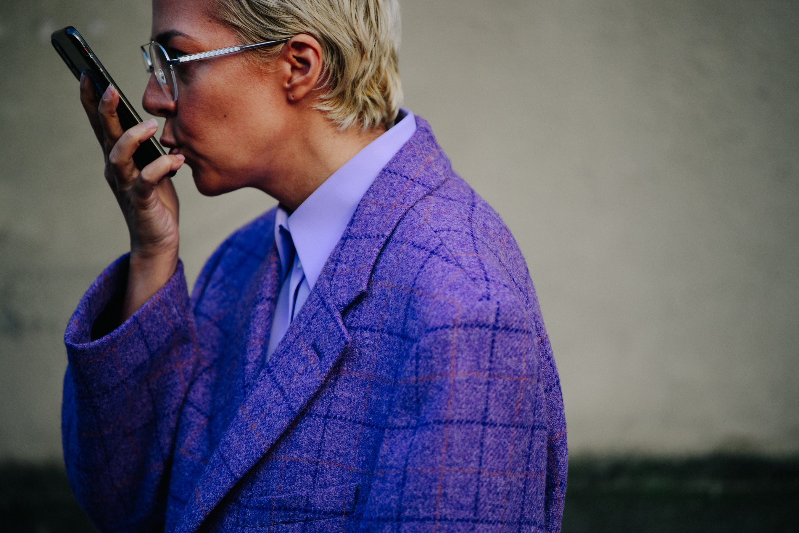 Woman wearing purple wool coat