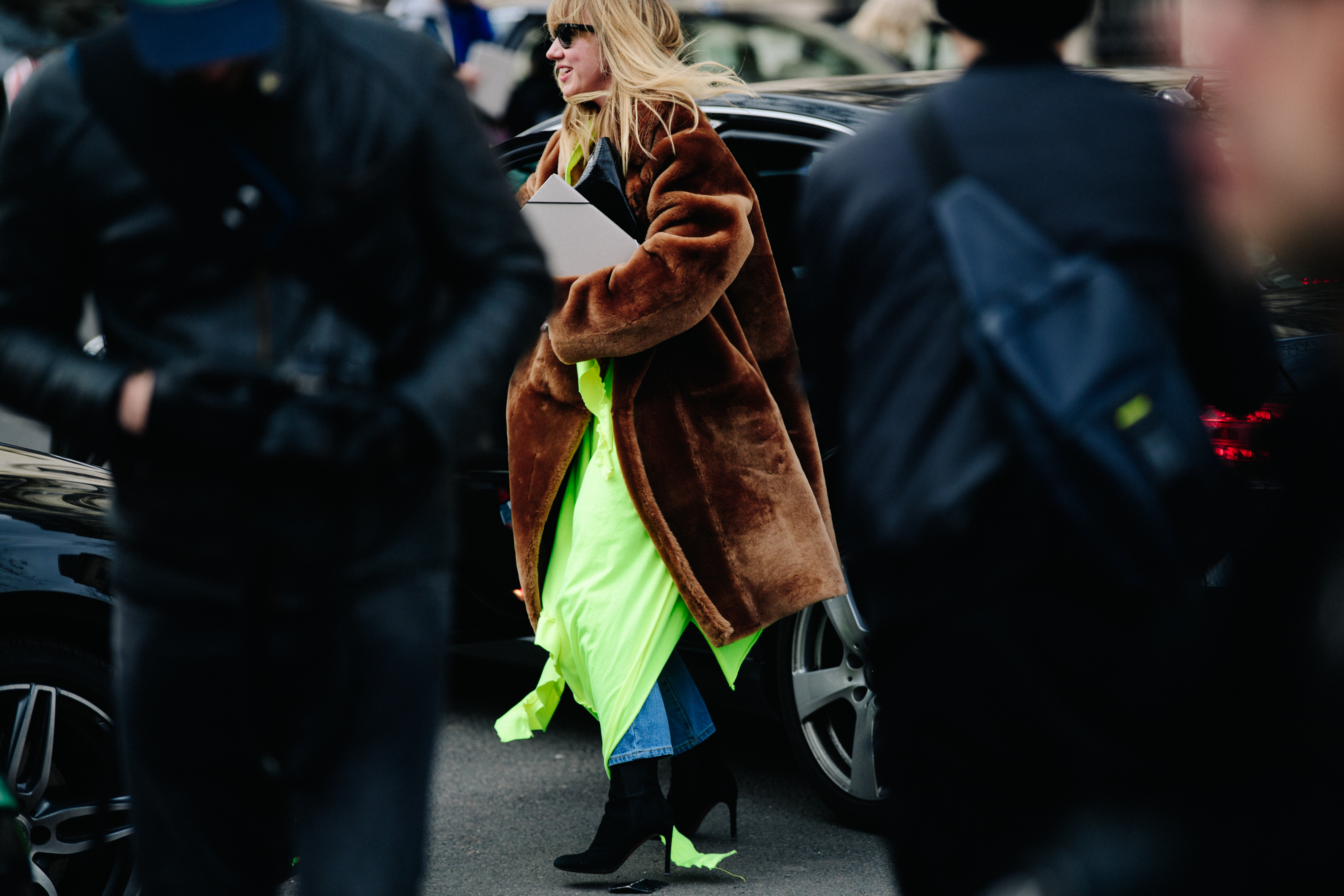 Woman wearing brown fur coat