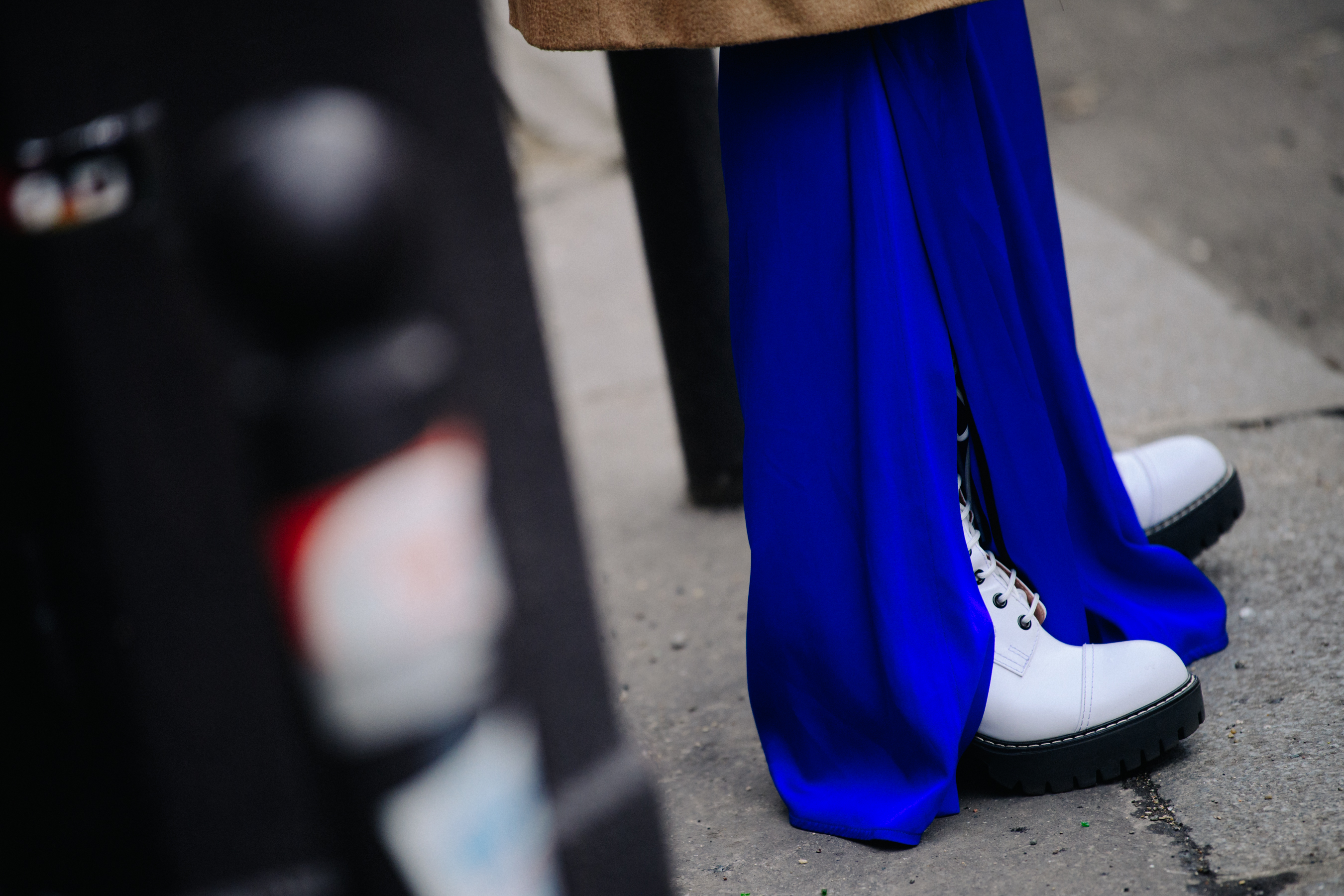 Asian woman wearing white boots