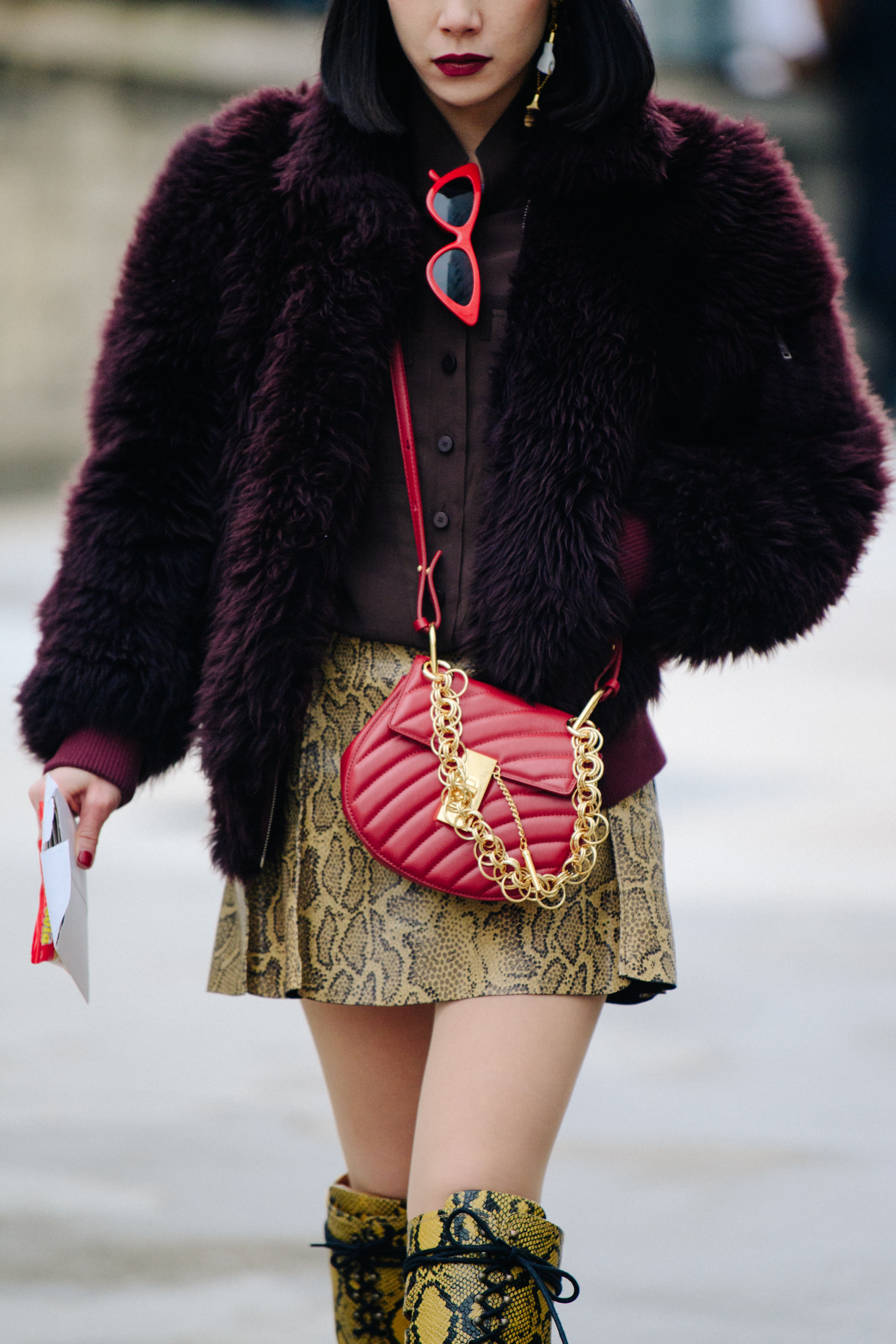 Asian woman carrying red Chloé bag