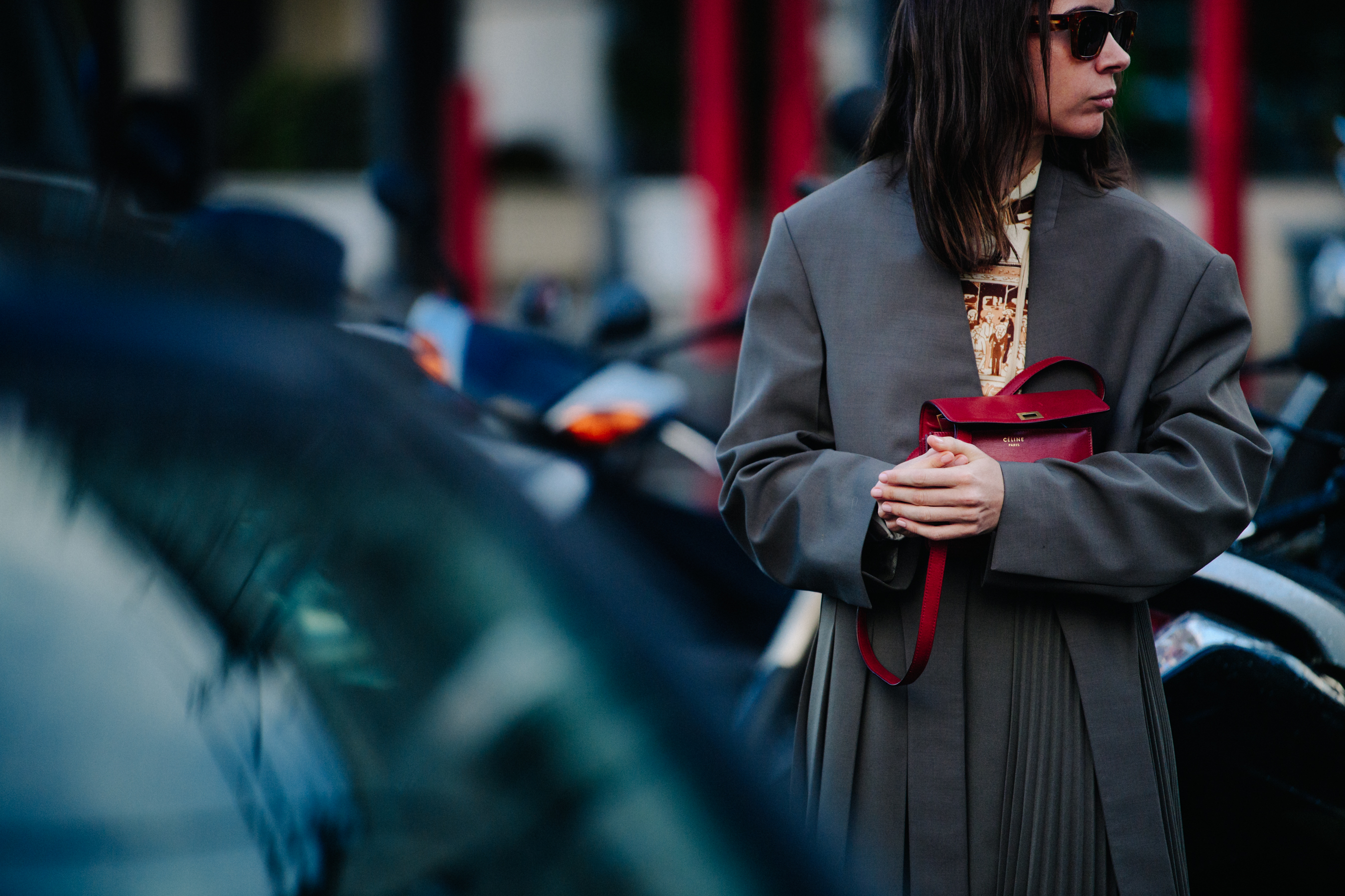 Russian woman wearing long grey coat
