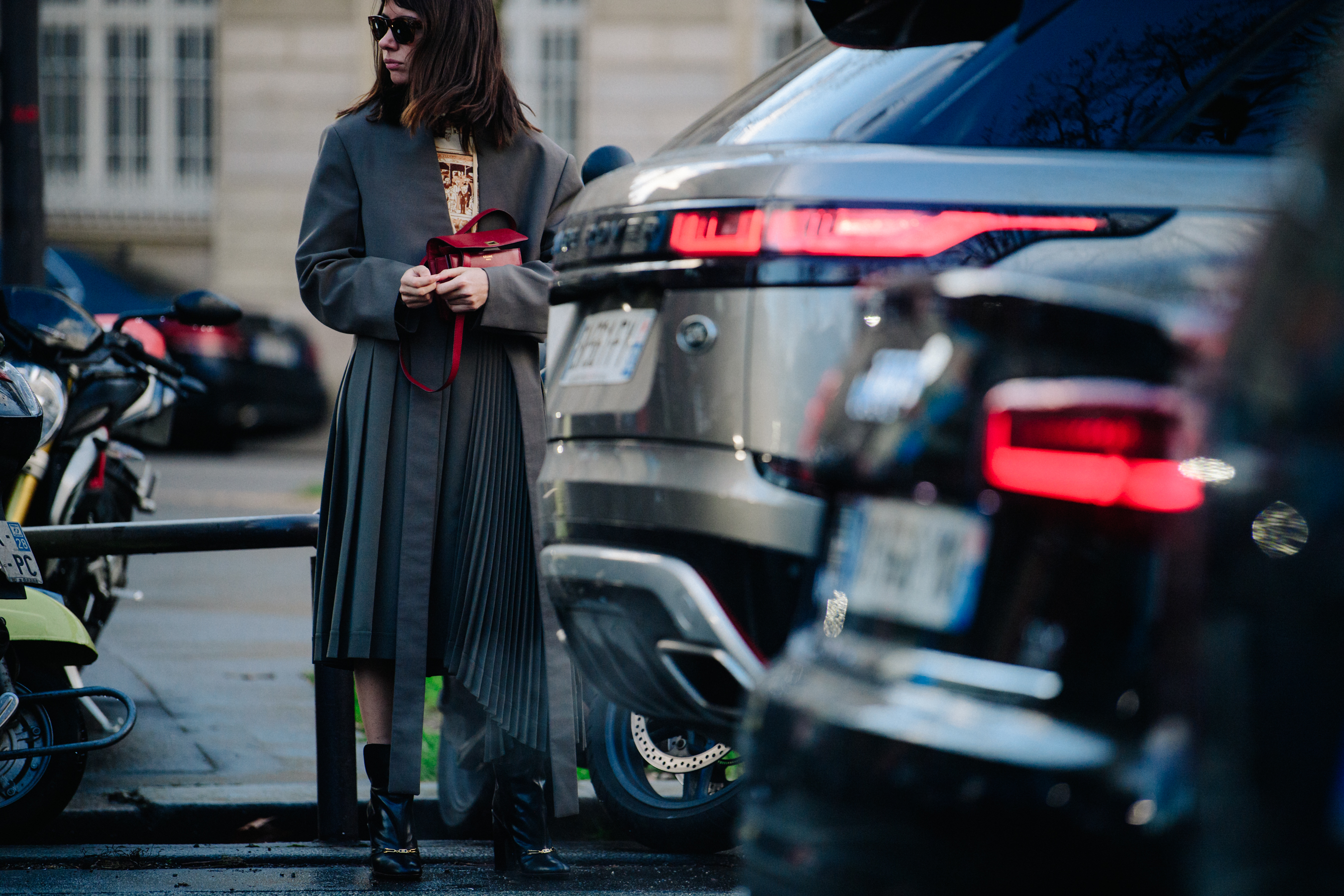 Russian woman wearing long grey coat