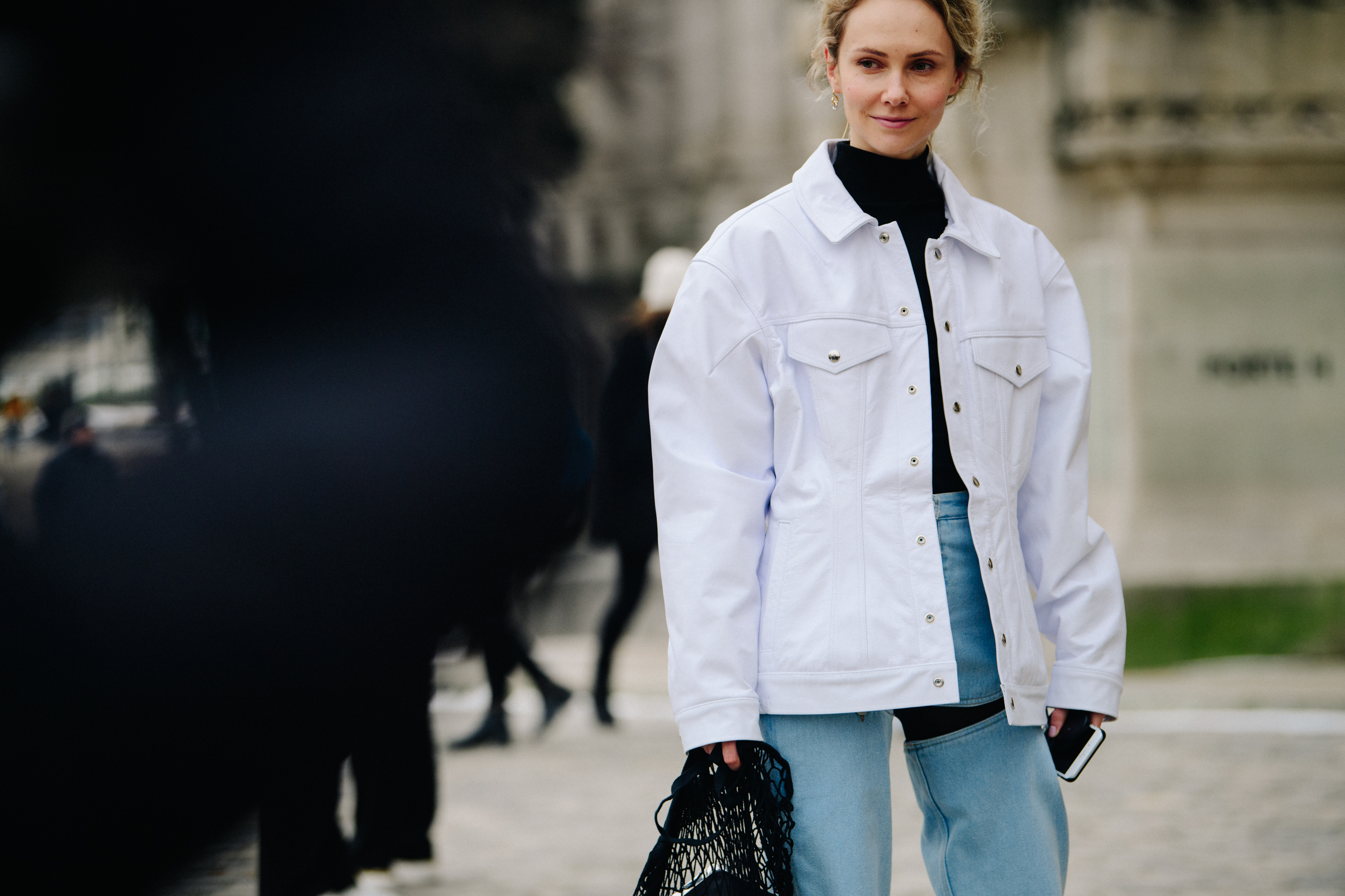 Russian woman wearing white denim jacket