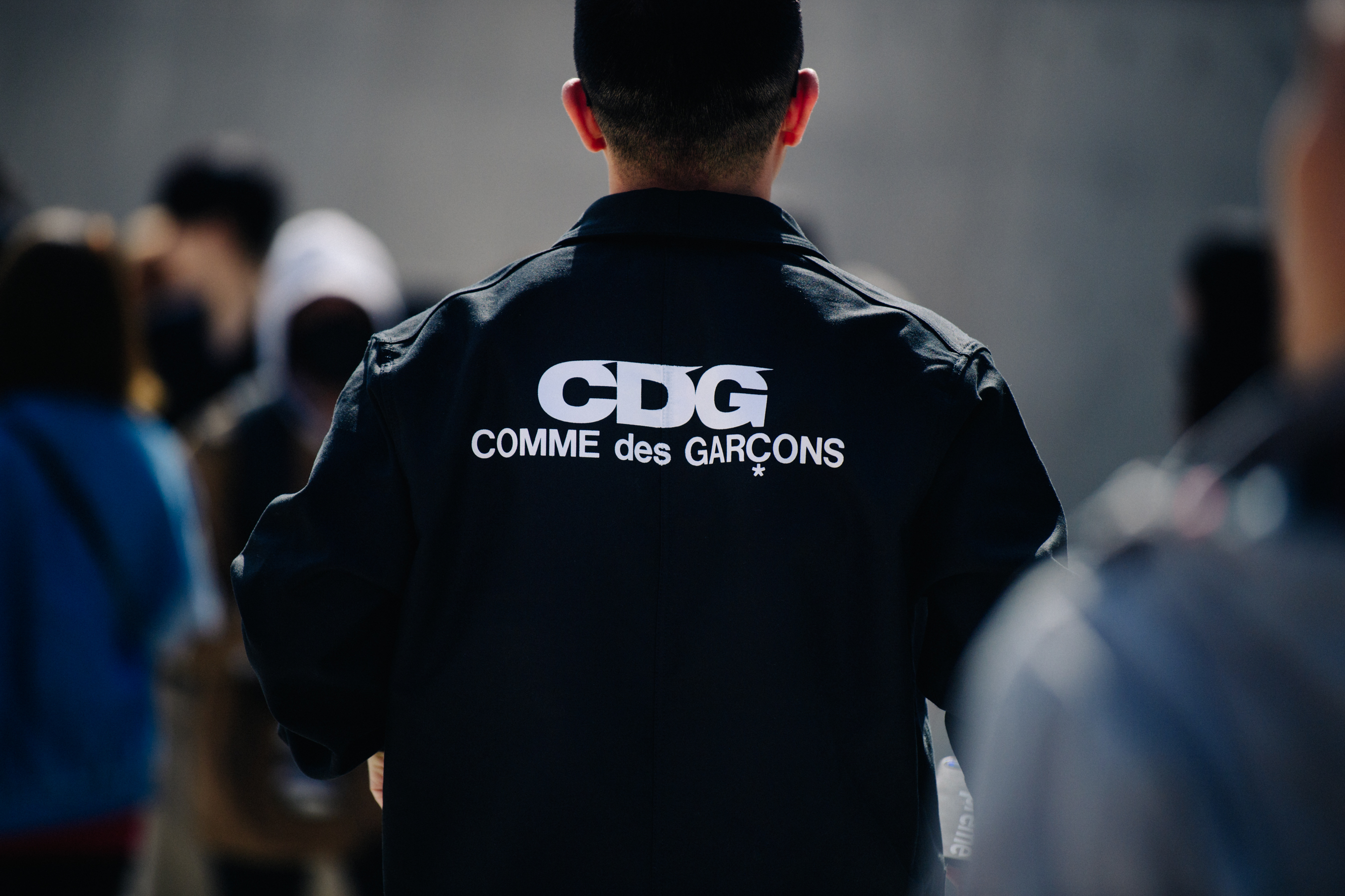 Man wearing Comme des Garcons jacket