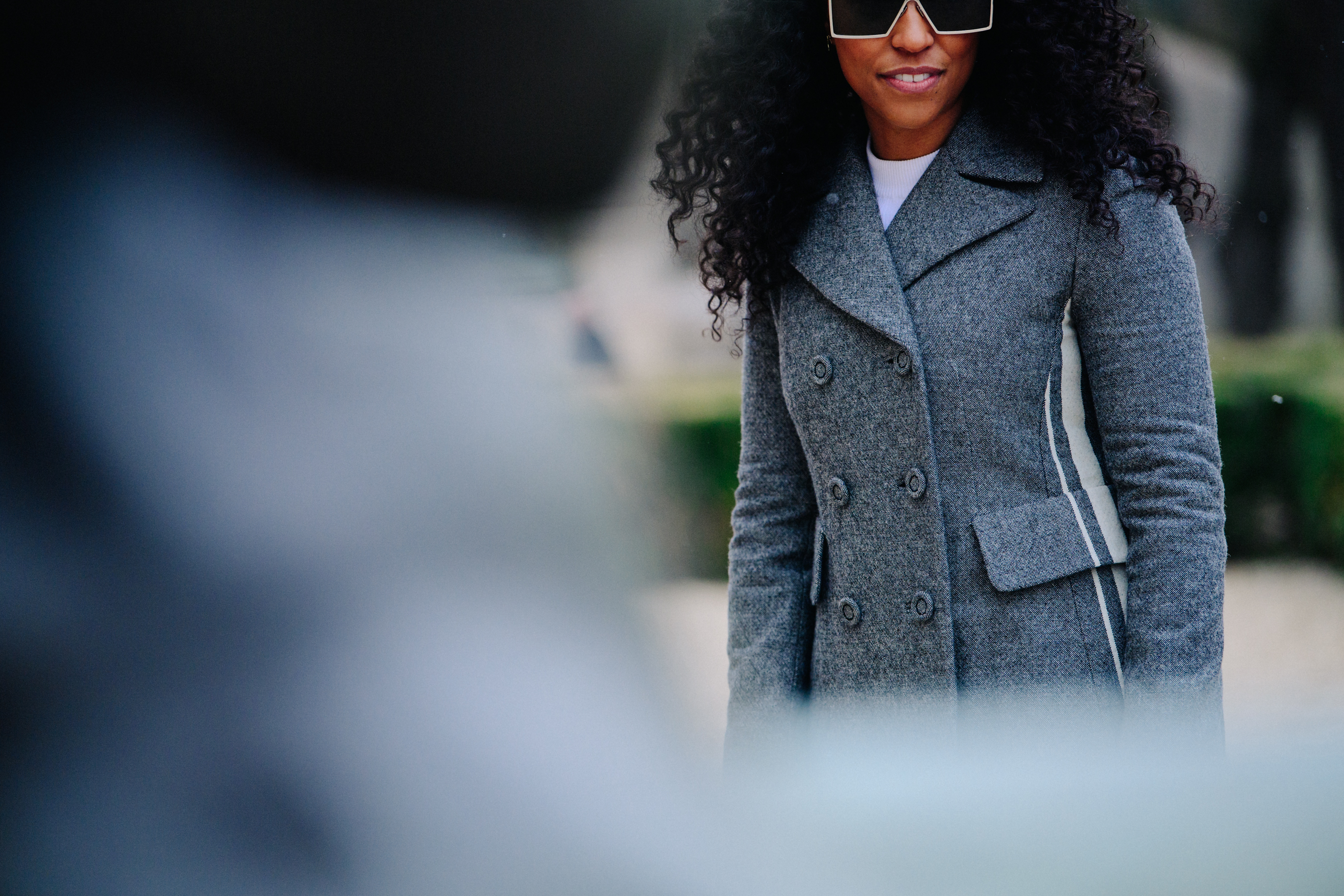 Woman wearing grey coat