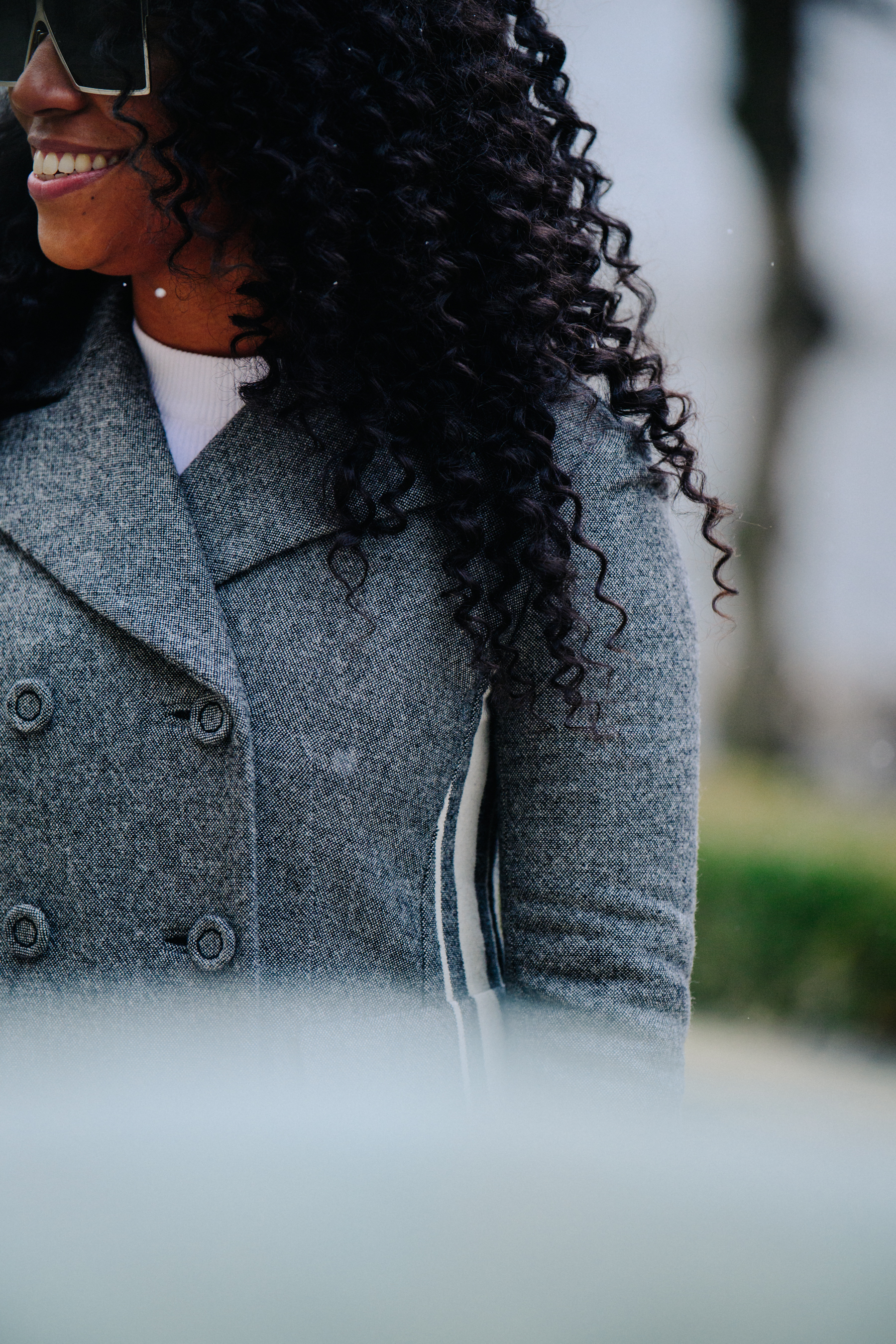 Woman wearing grey coat