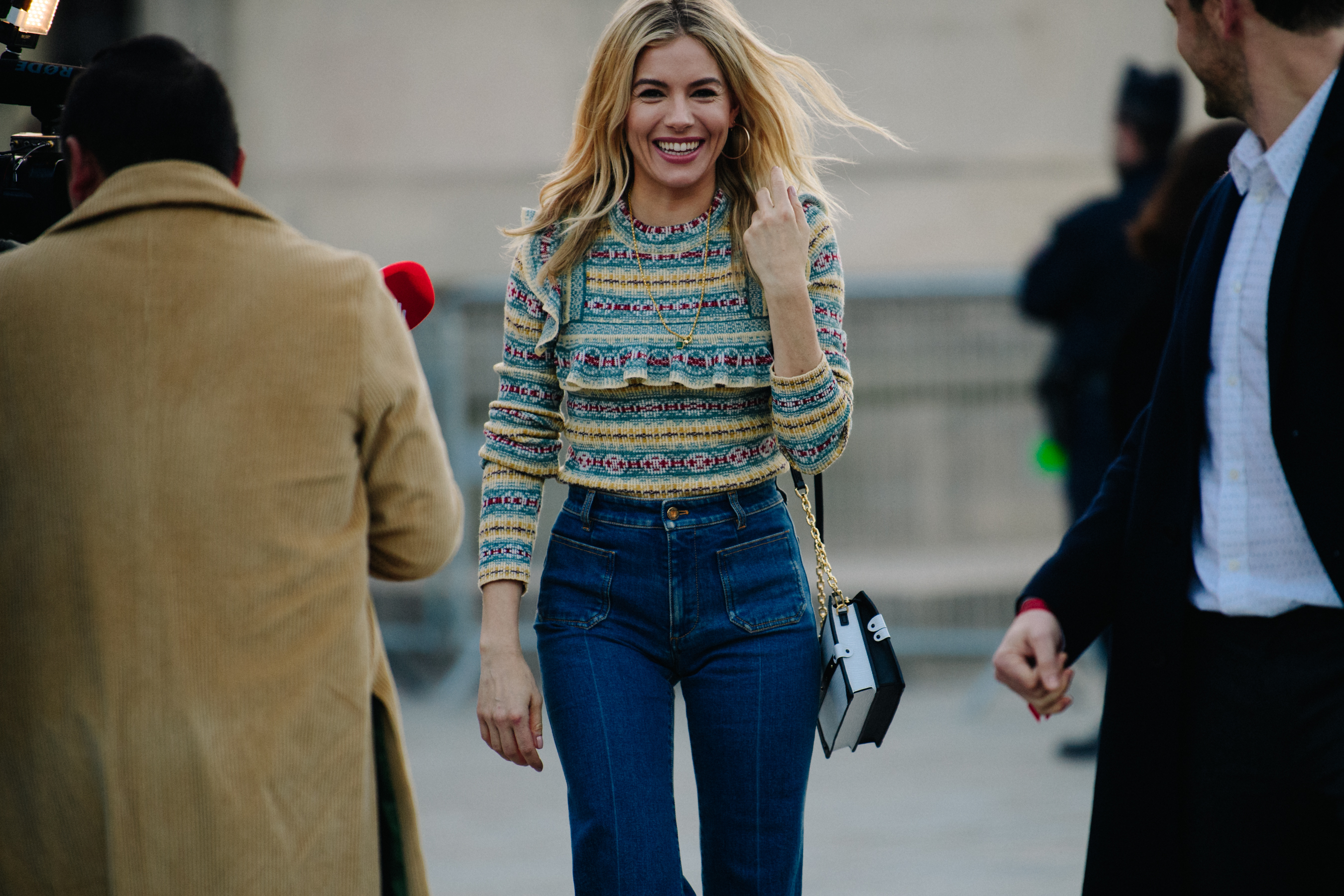 Blonde woman wearing pattern top