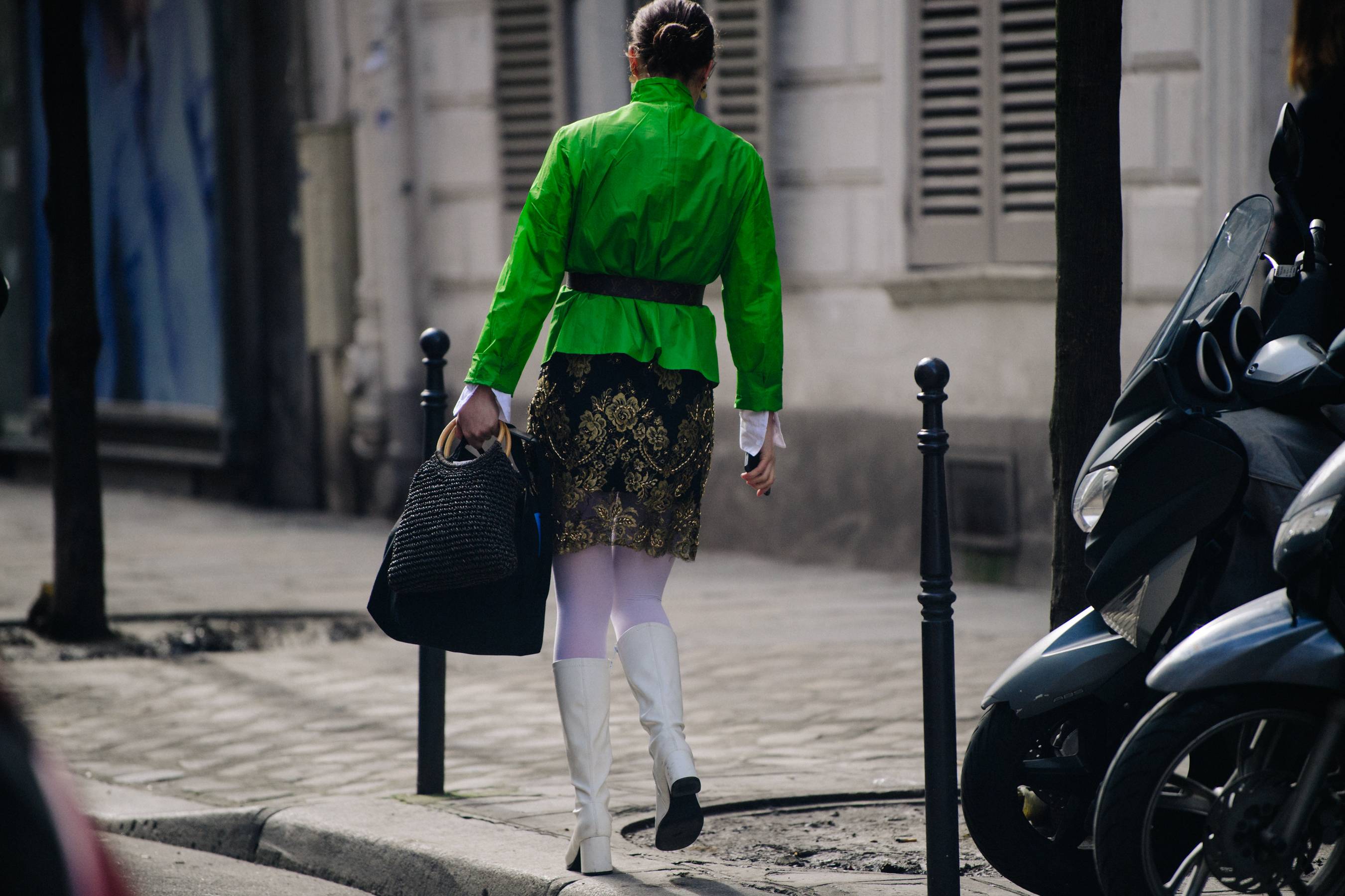Woman wearing bright green jacket