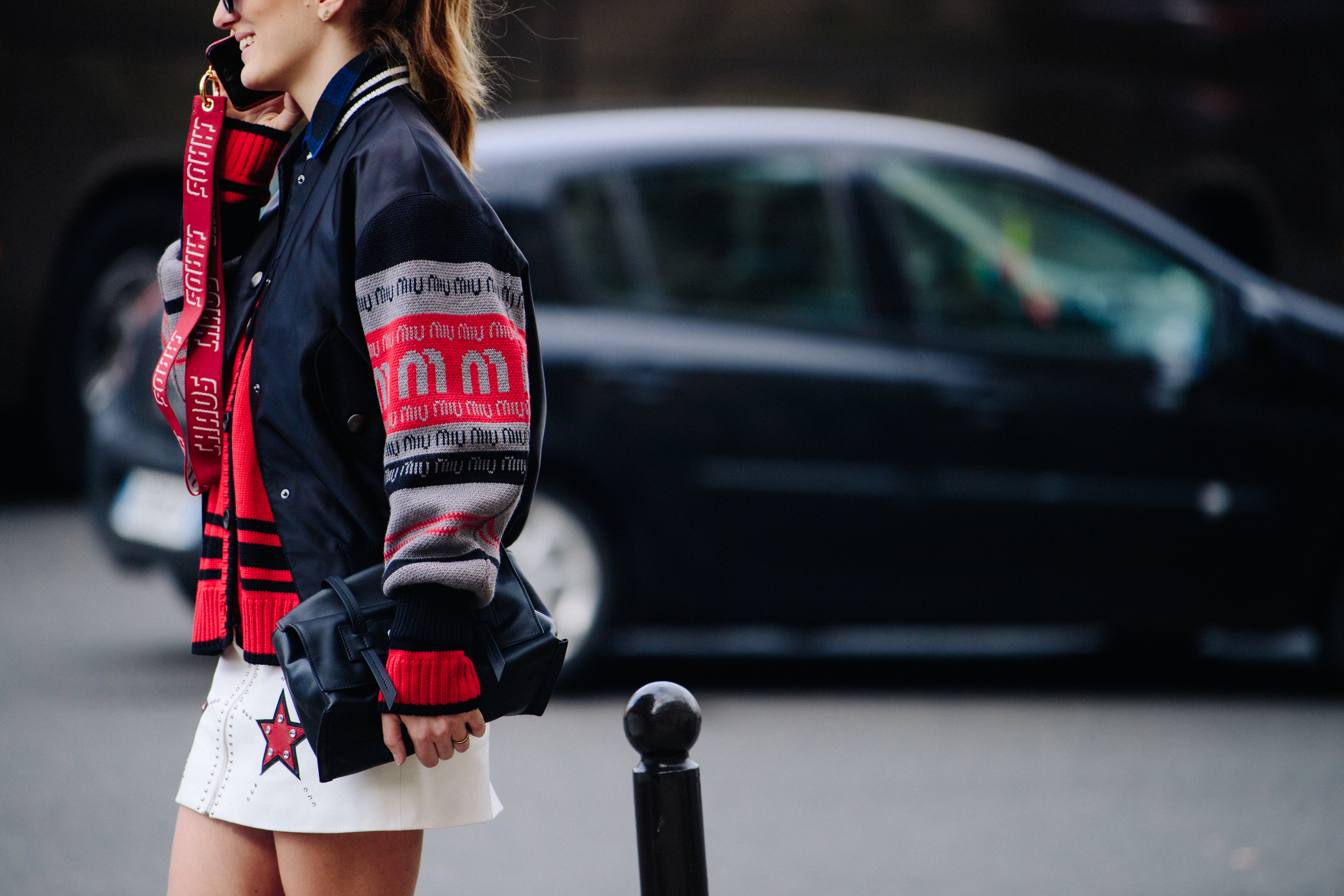 Woman wearing Miu Miu jacket