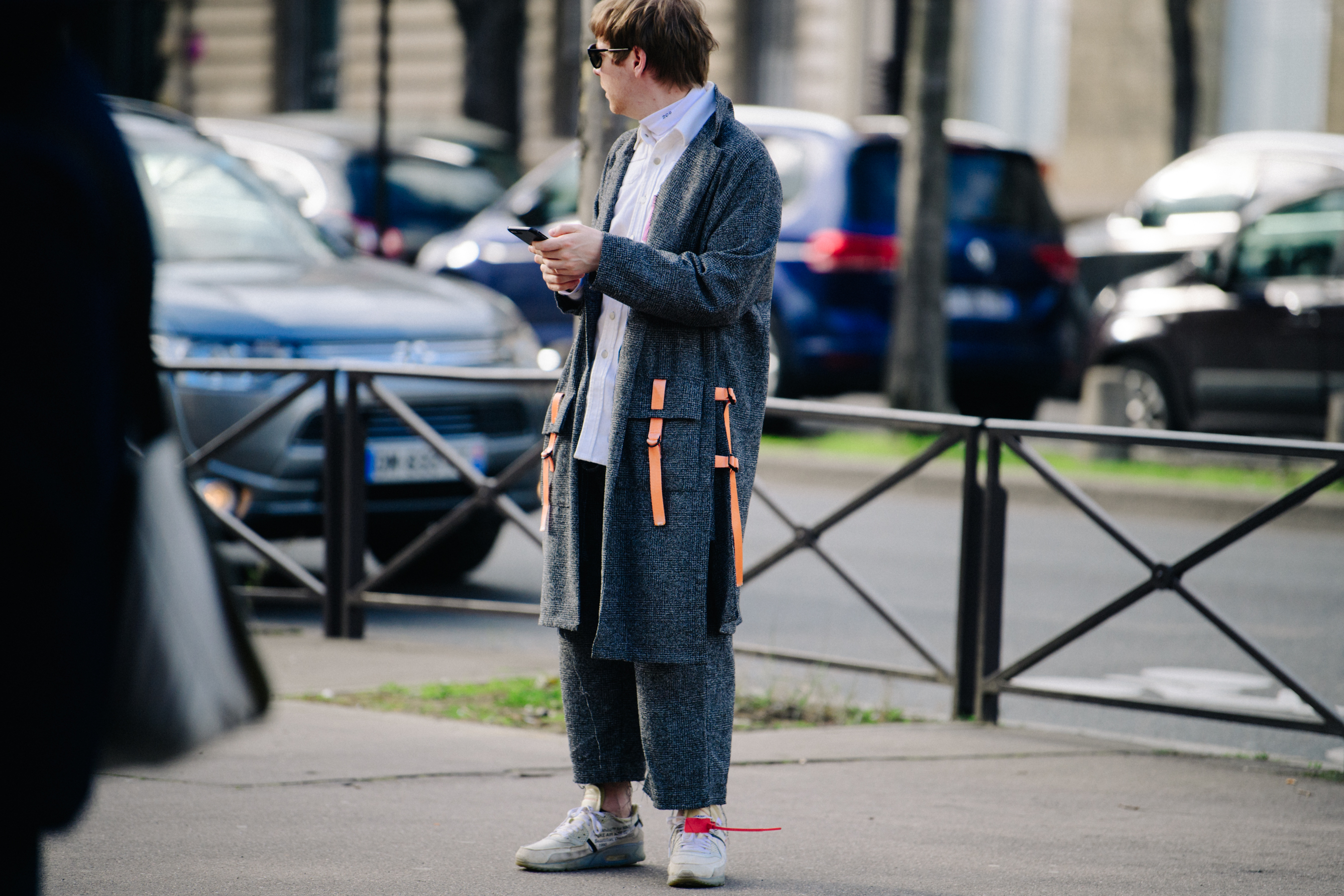 Man wearing long grey coat