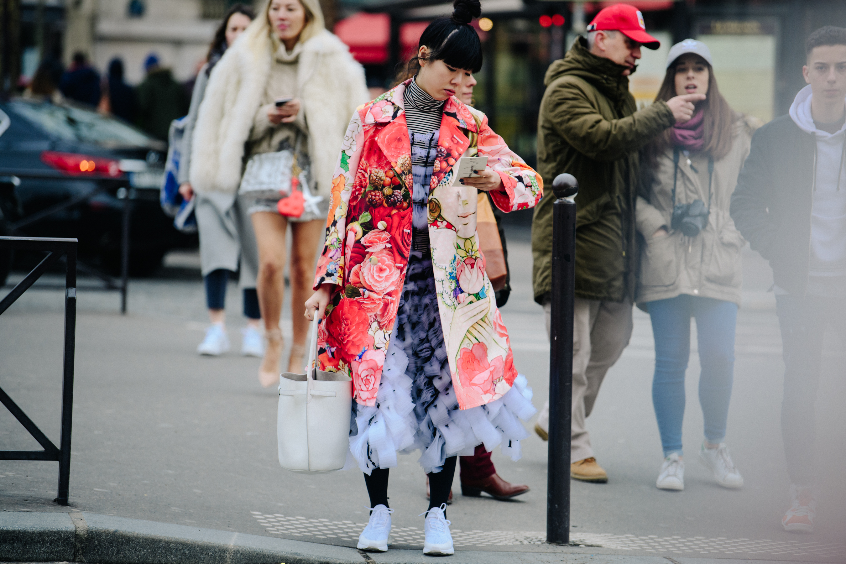 Asian blogger wearing floral coat