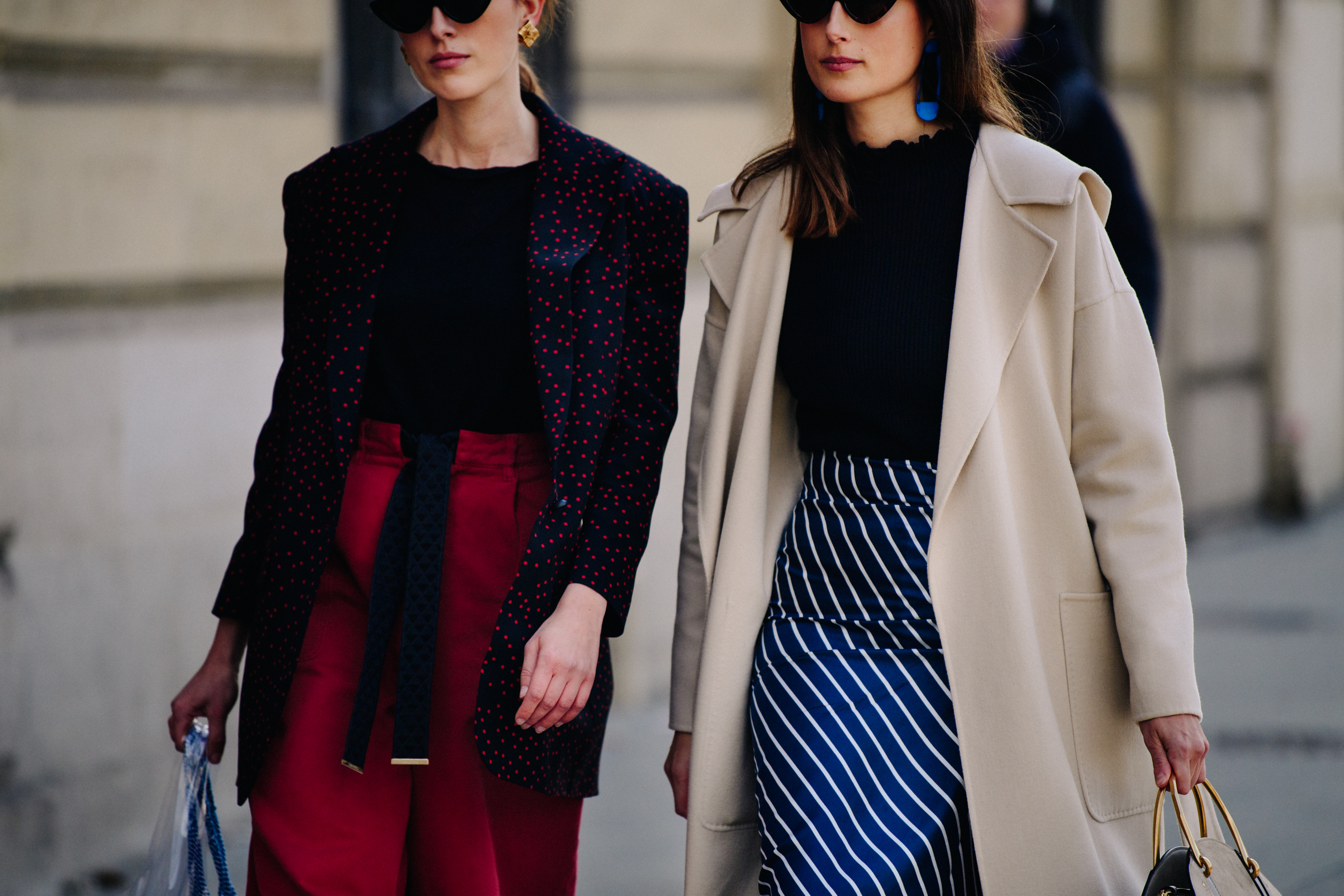 Two women wearing spots and stripes
