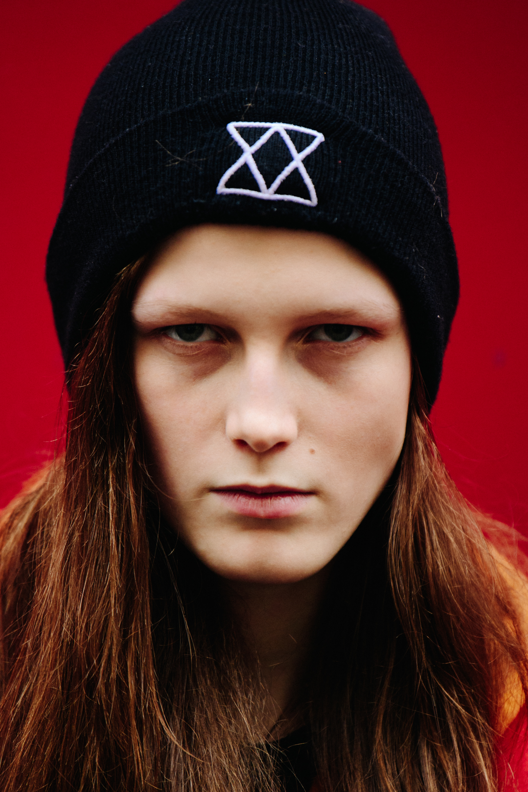 Portrait of model wearing black beanie