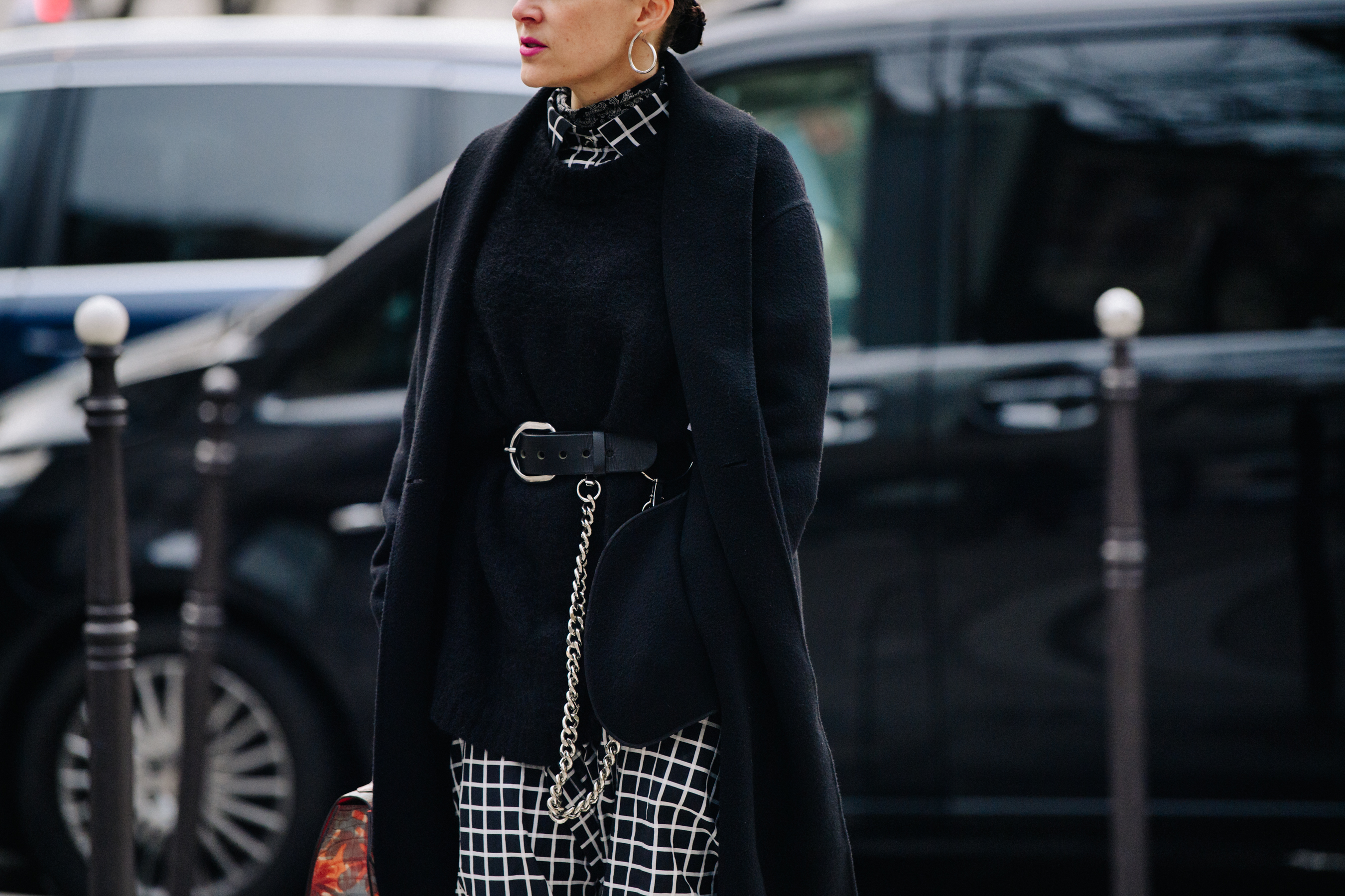 Woman wearing black wool coat