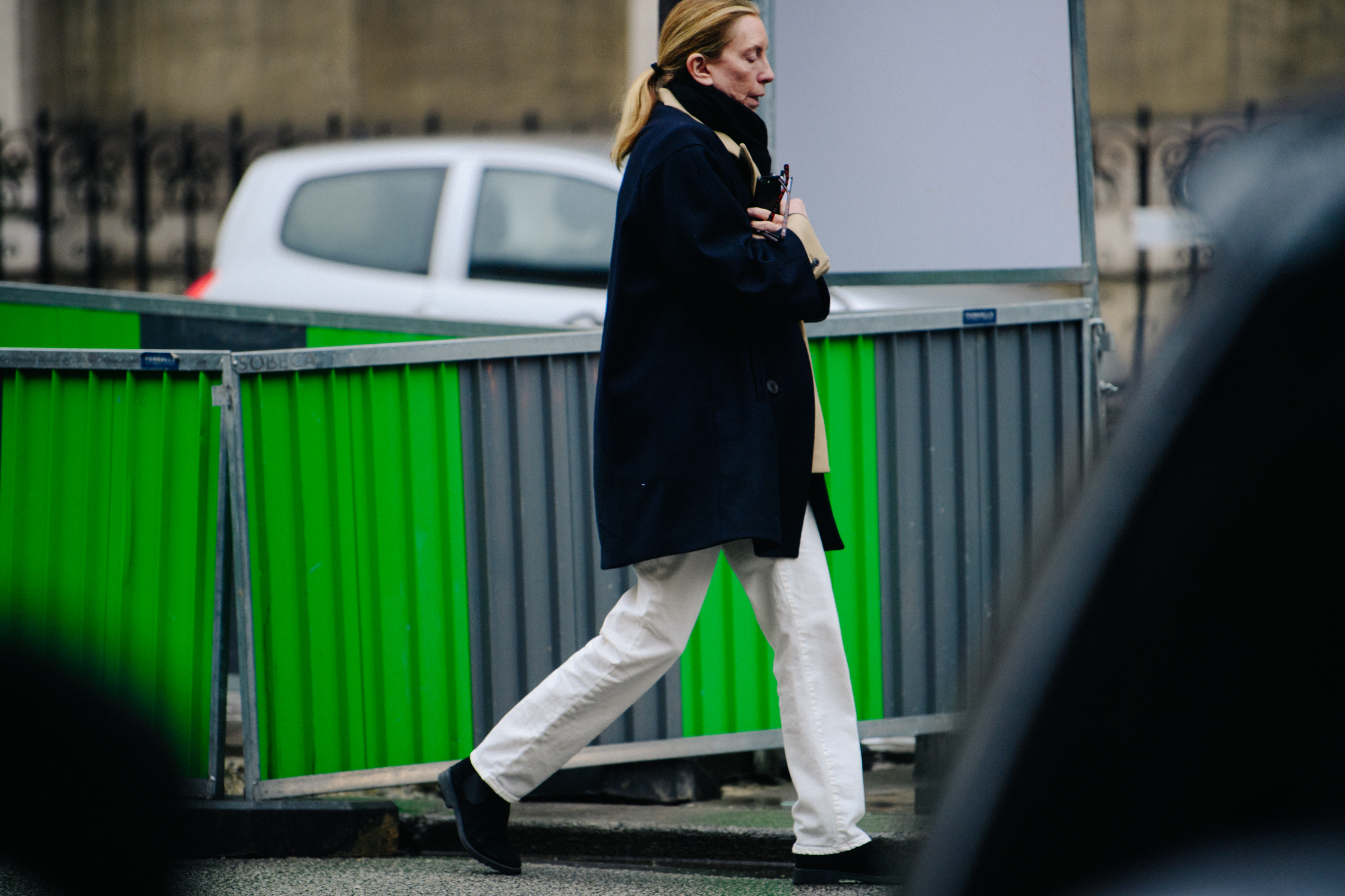 Woman wearing white denim jeans