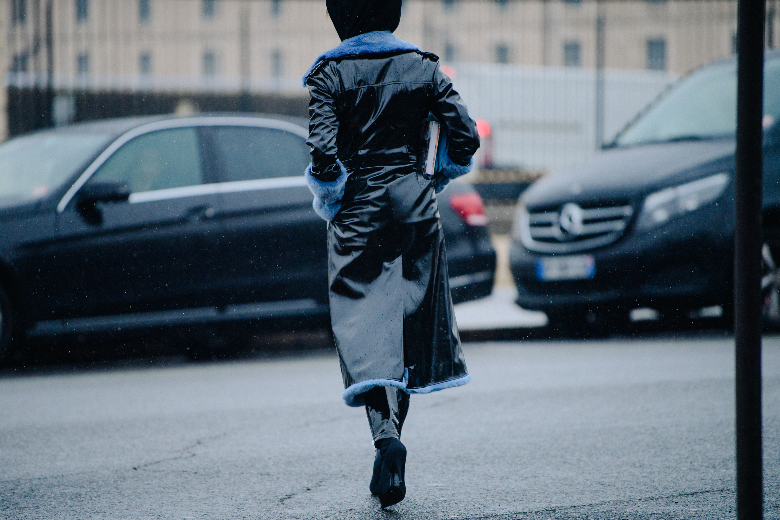 Asian blogger wearing blue fur trim coat