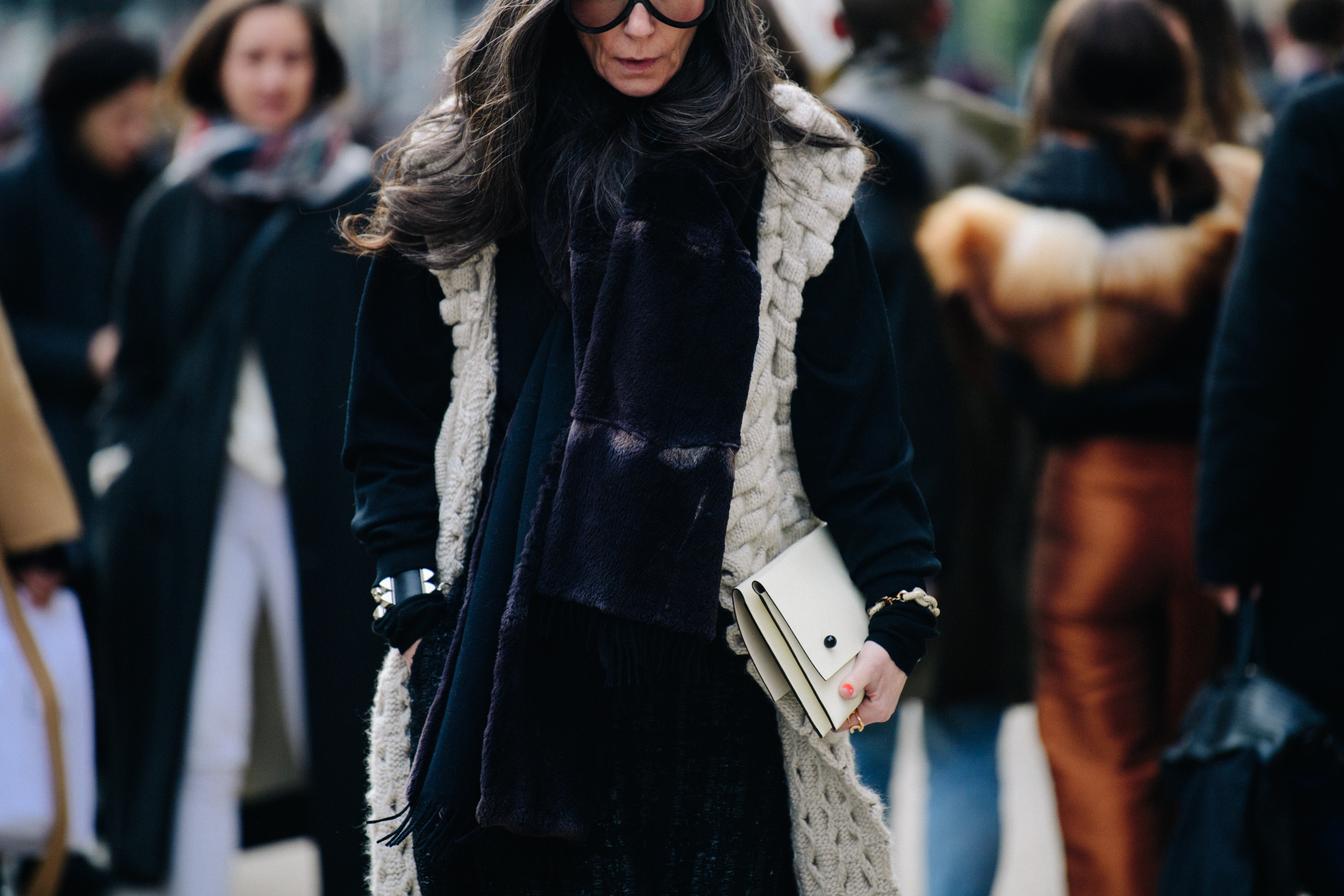 Woman wearing black and white knit outfit