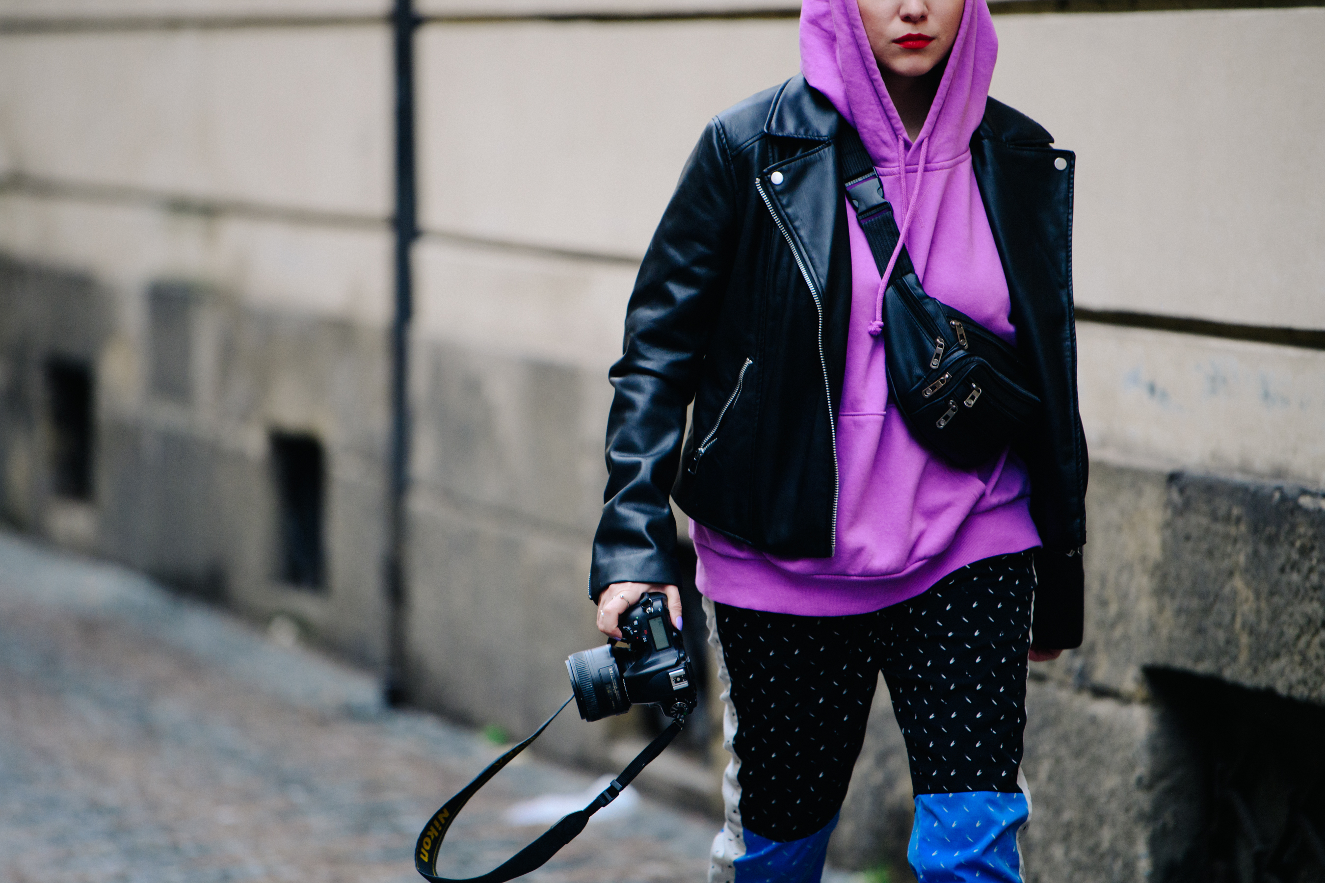 Woman wearing purple hoodie