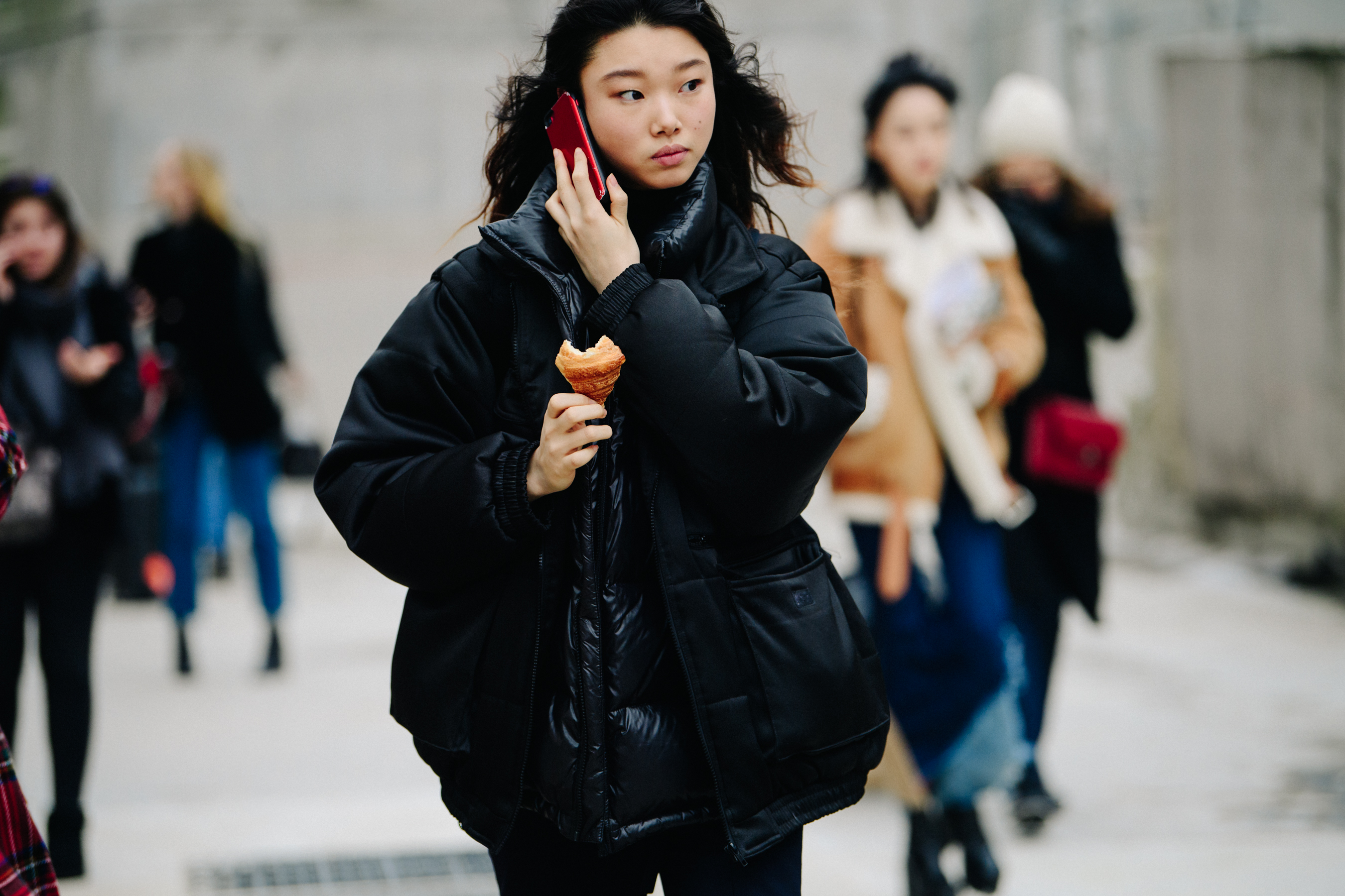 Asian model wearing black coat