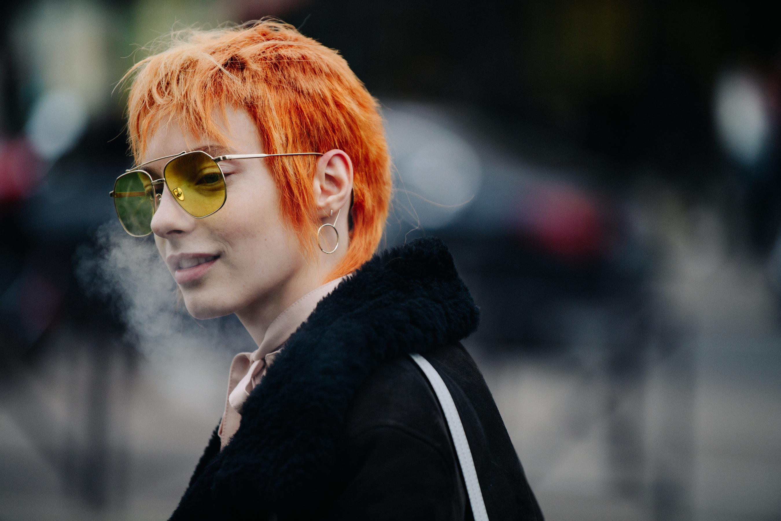 Model wearing yellow lens glasses
