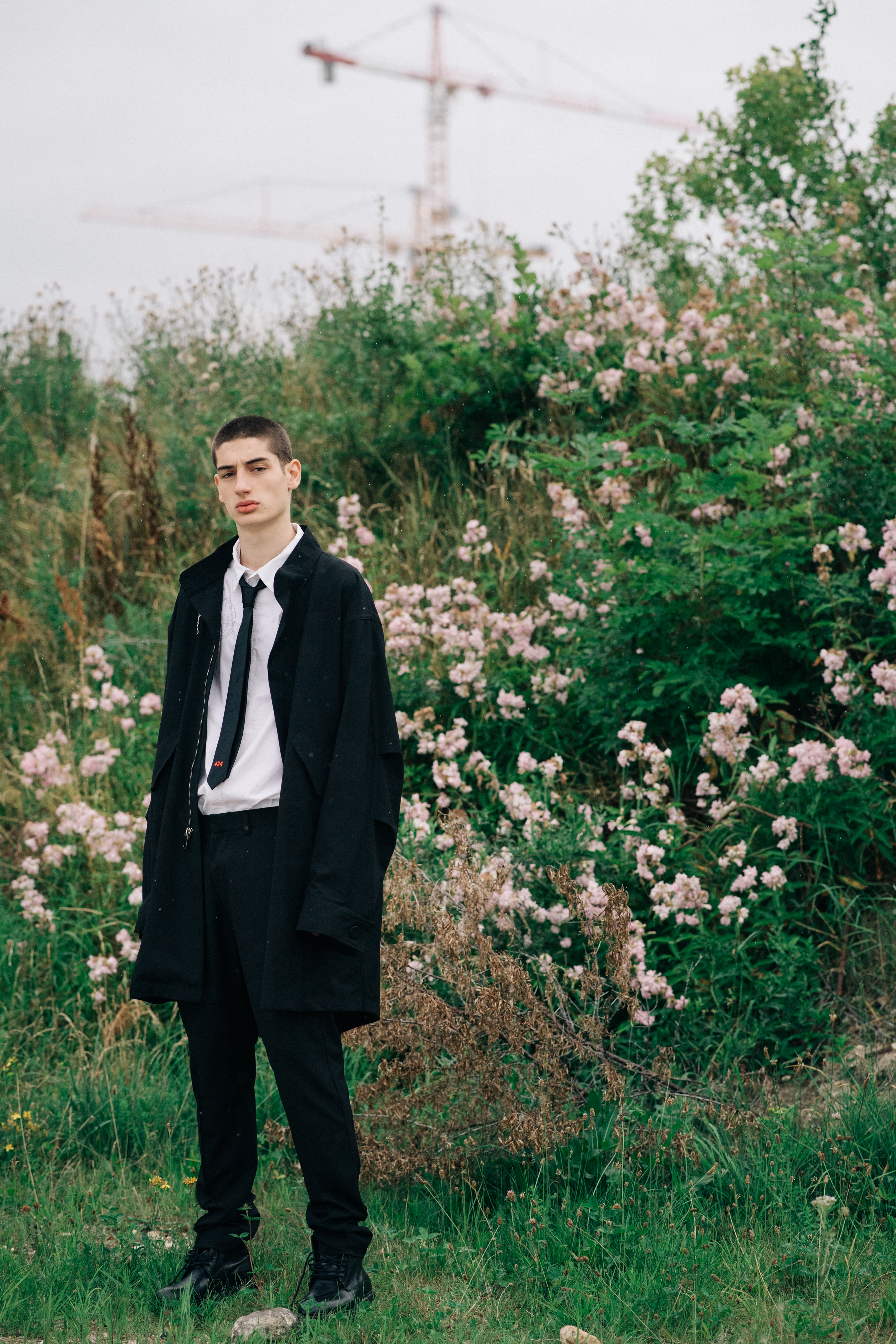 Male model wearing white shirt and a suit