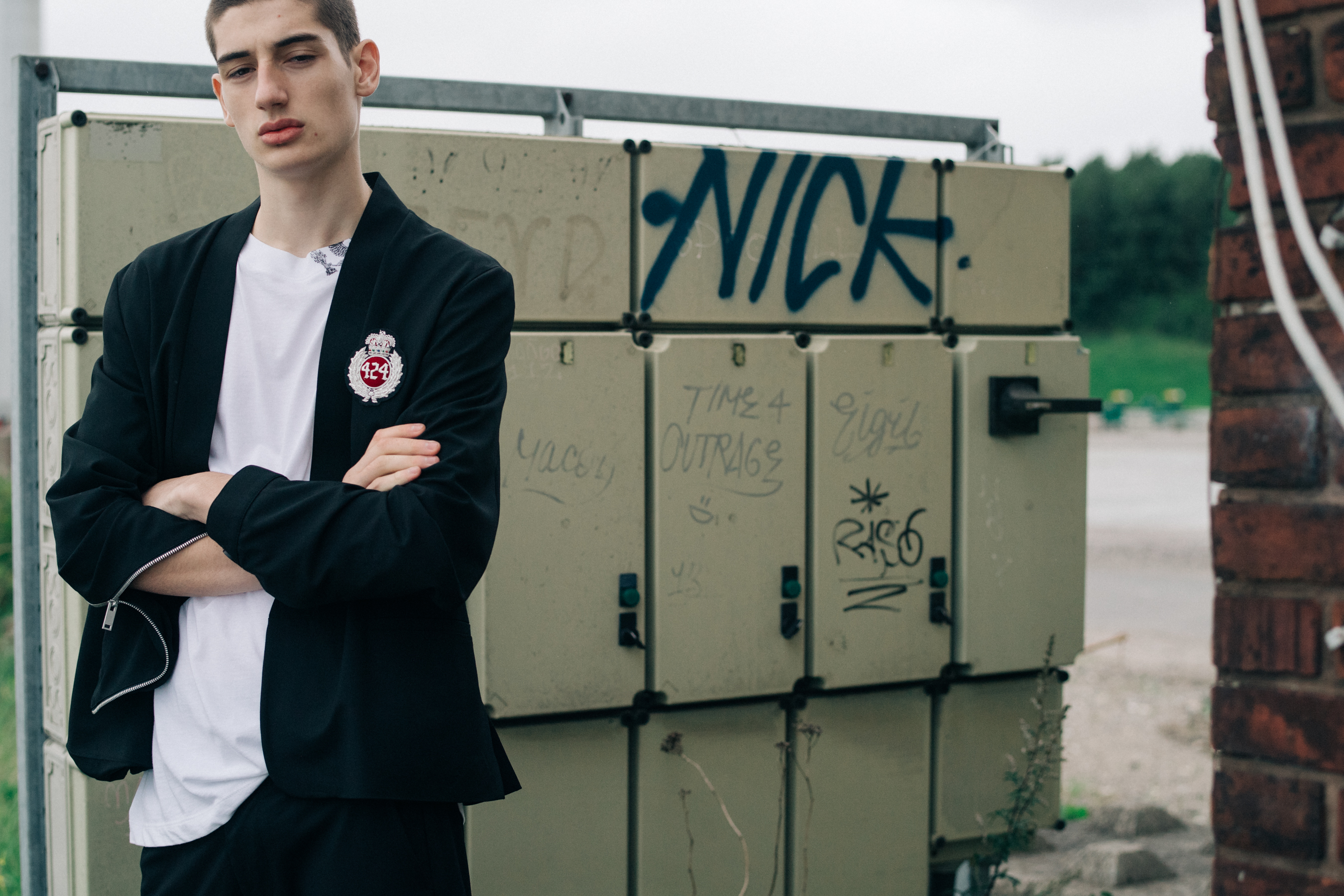 Male model wearing white shirt and a suit
