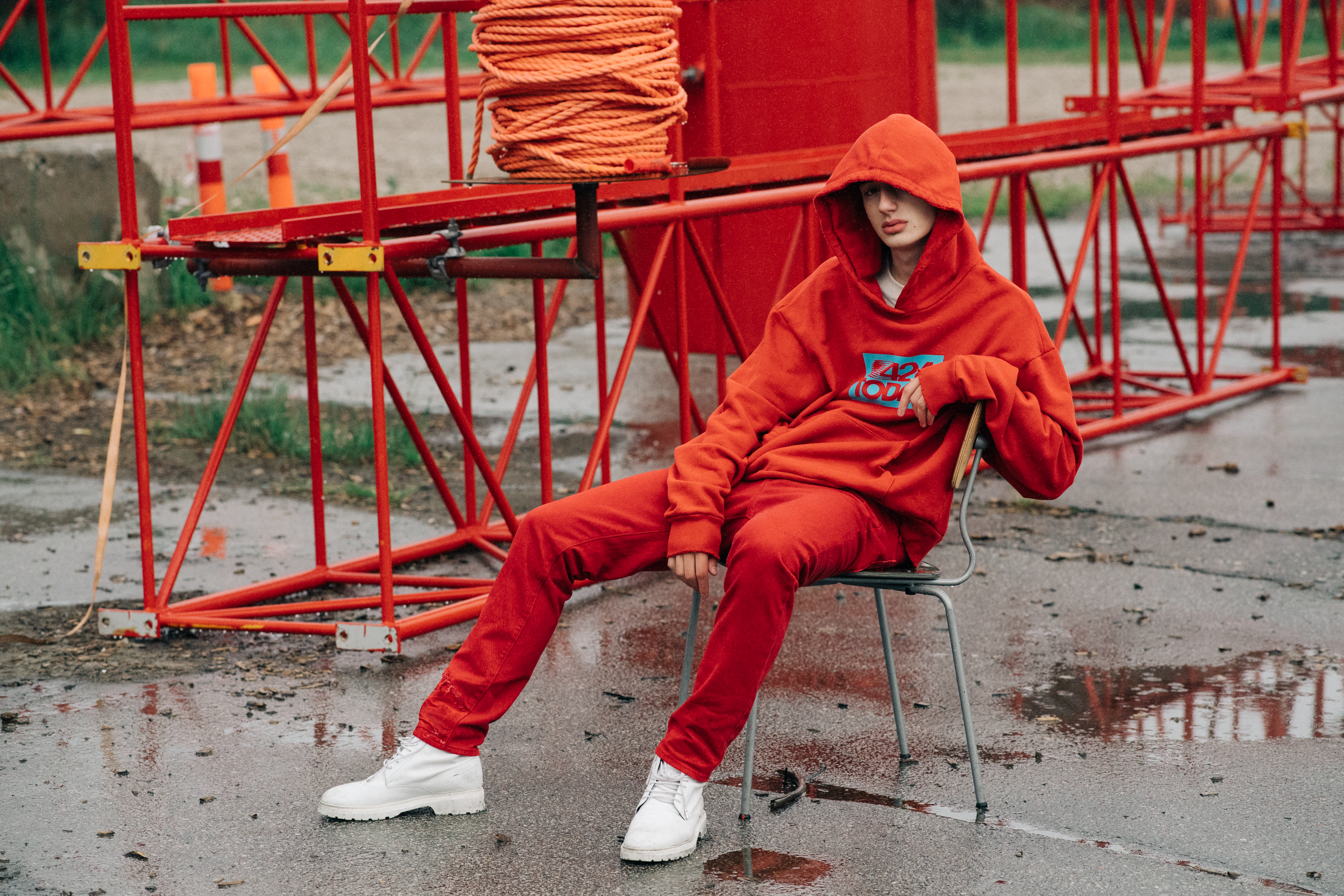 Male model wearing red street wear