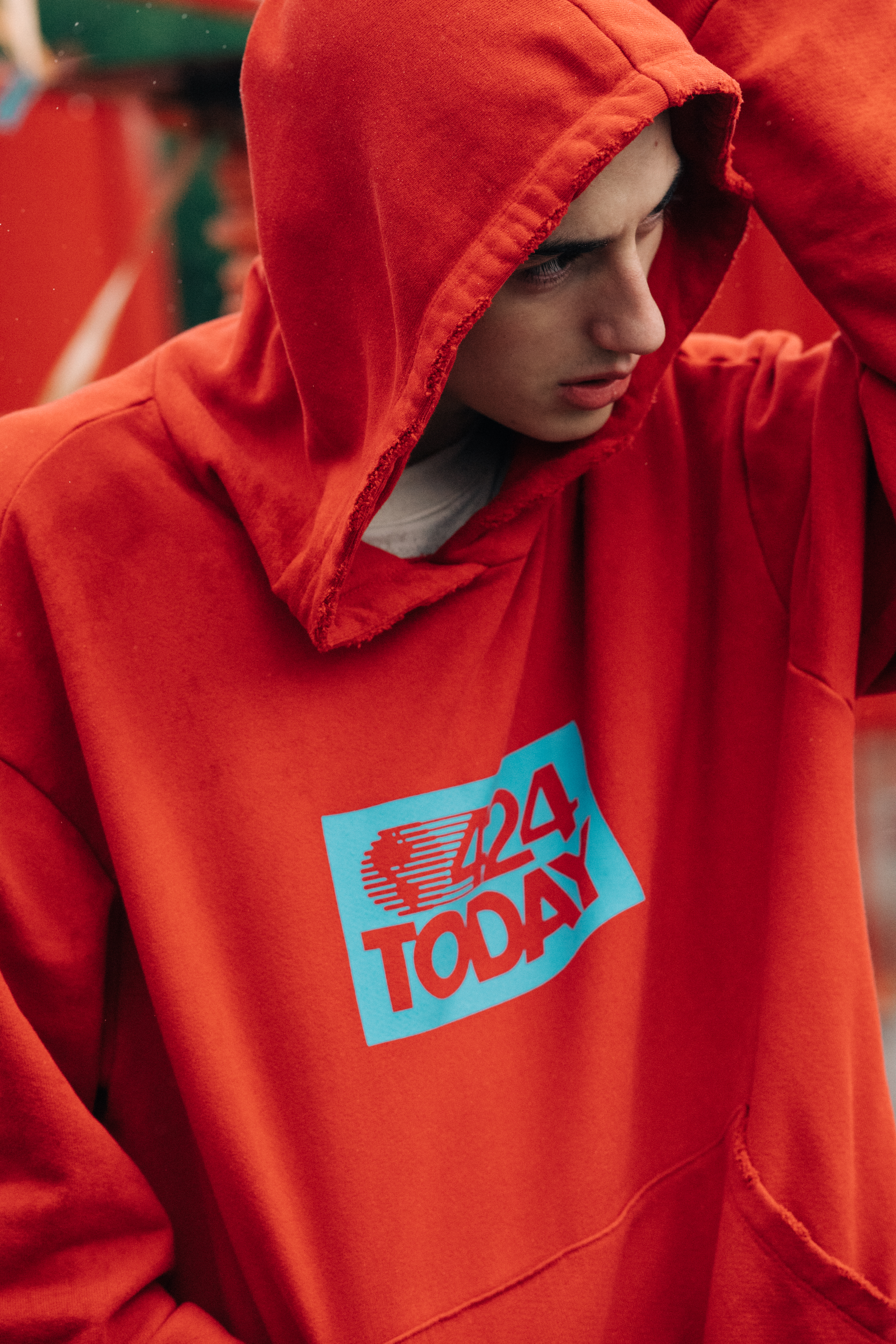 Male model wearing red street wear
