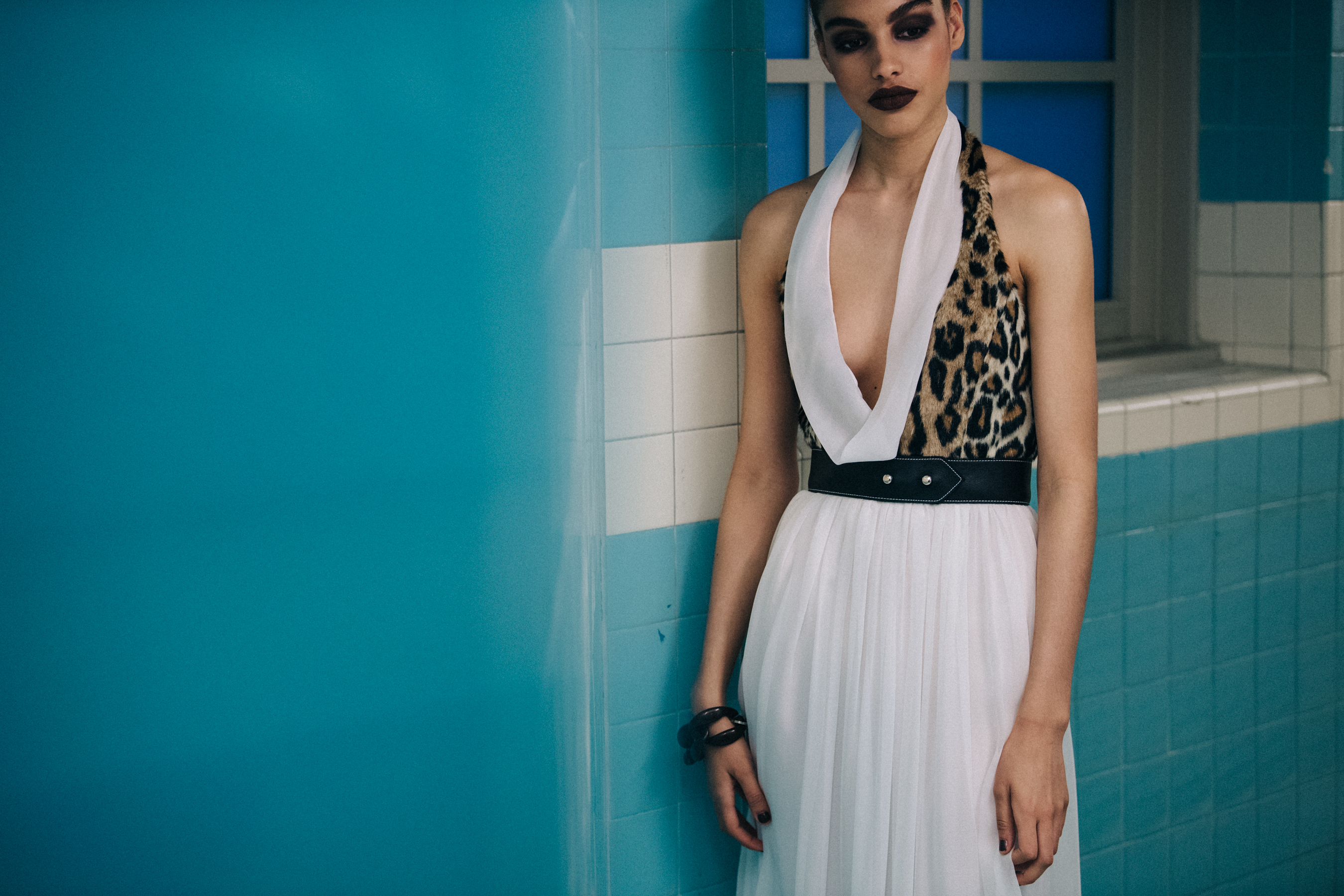 Model wearing animal print outfit backstage